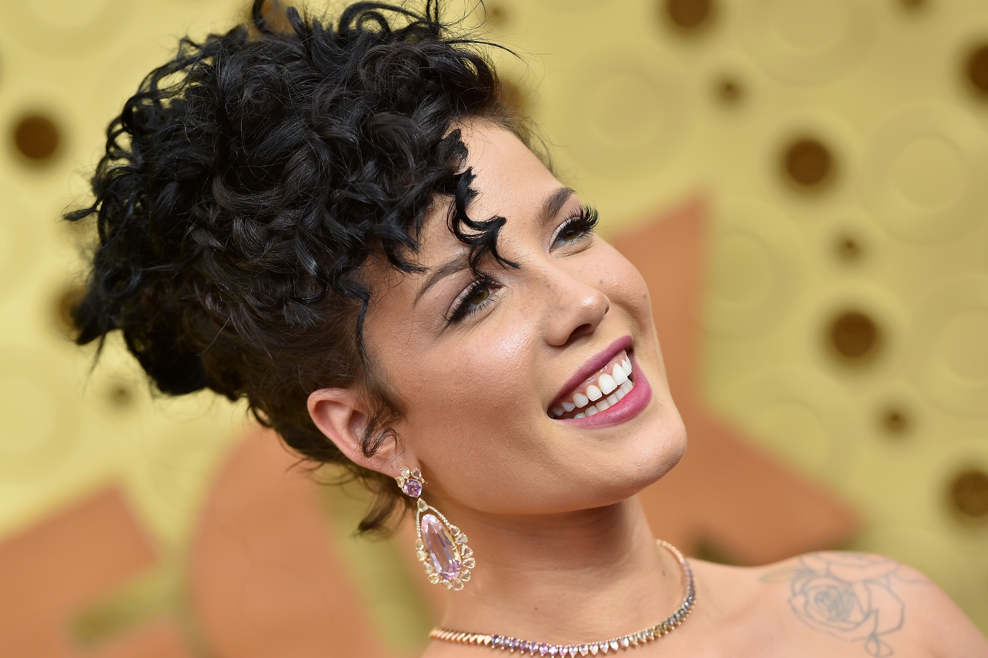 Halsey smiles on the red carpet of the 71st Emmy Awards in 2019