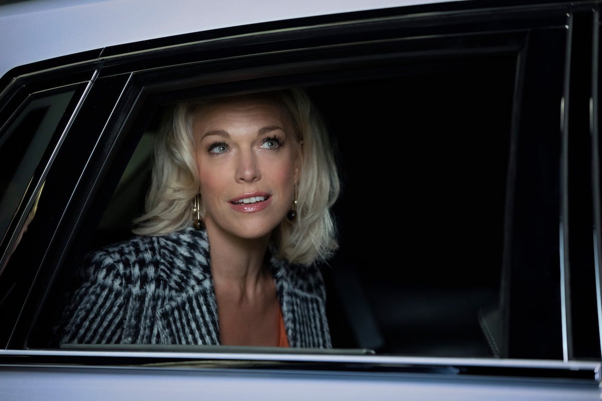 Hannah Waddingham sits in a car with the window rolled down as Rebecca Welton on 'Ted Lasso'