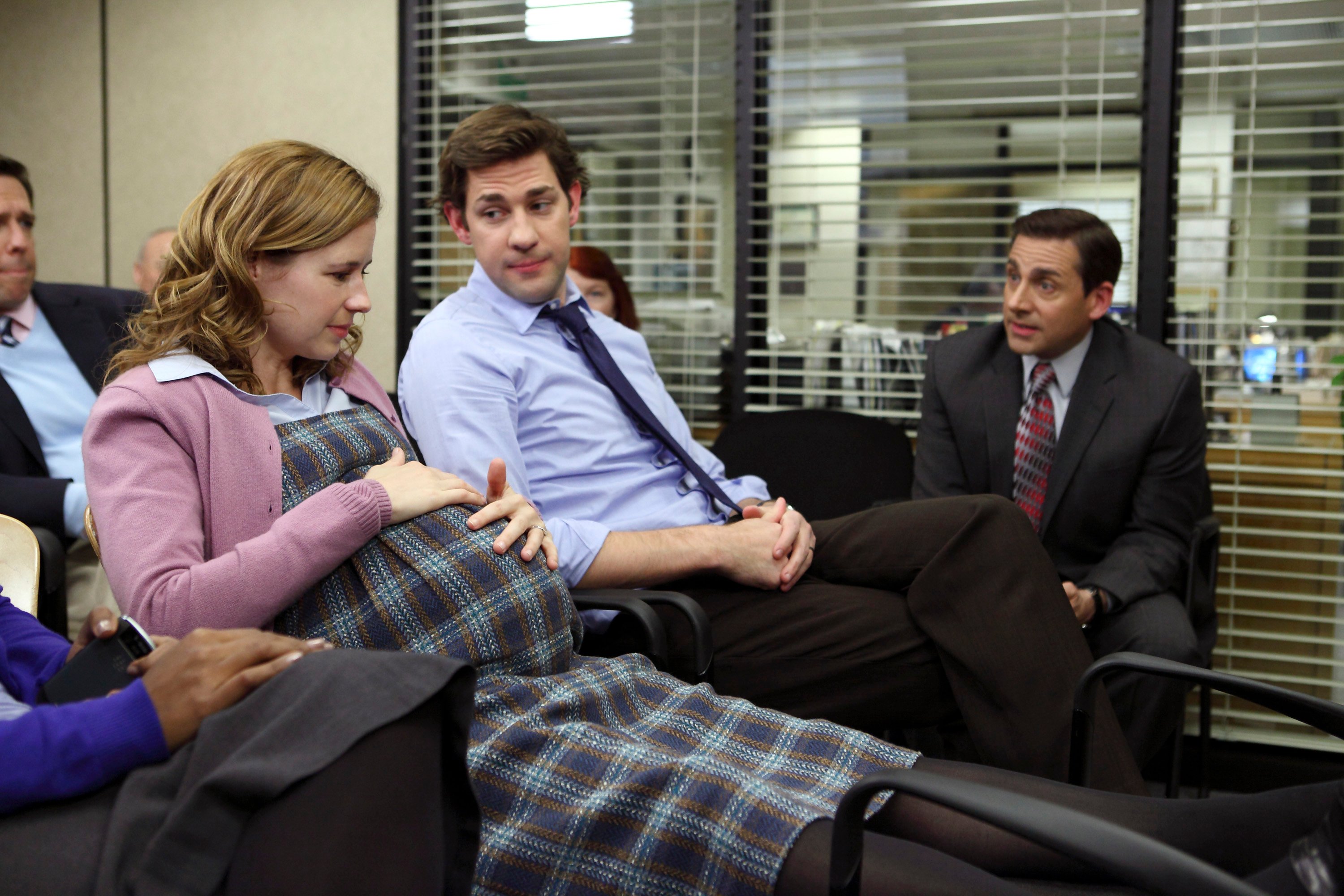 Jenna Fischer as Pam Beesly and John Krasinski as Jim Halpert with Steve Carell as Michael Scott in an episode of 'The Office'