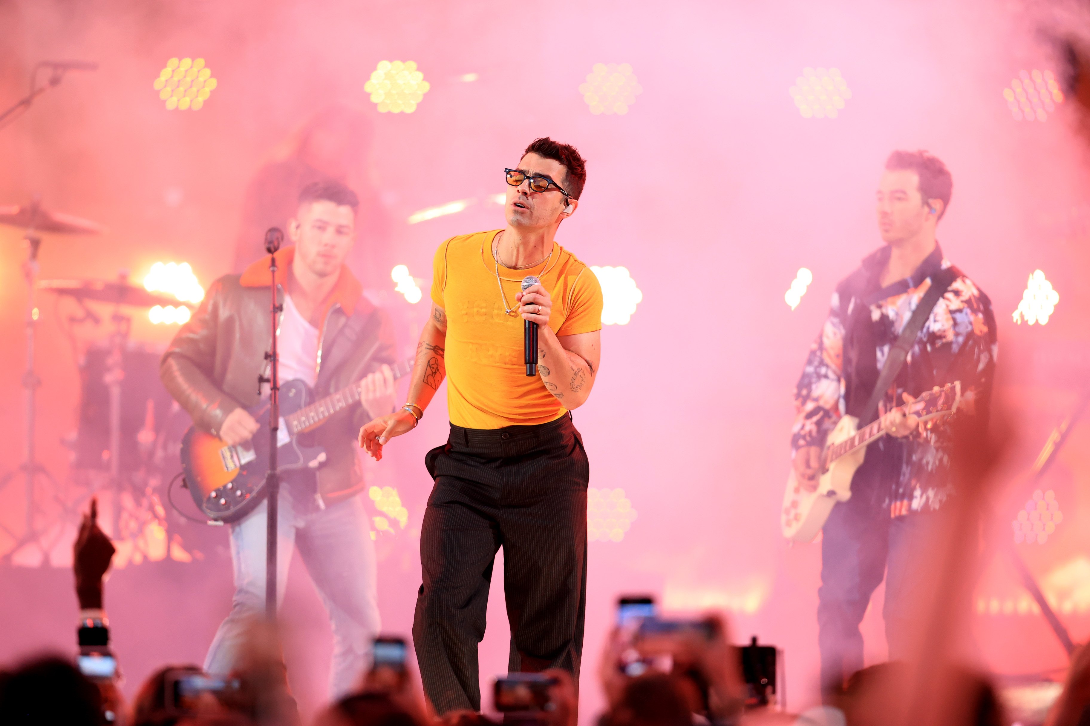 Nick Jonas, Joe Jonas, and Kevin Jonas of Jonas Brothers perform on stage during the 2021 Billboard Music Awards