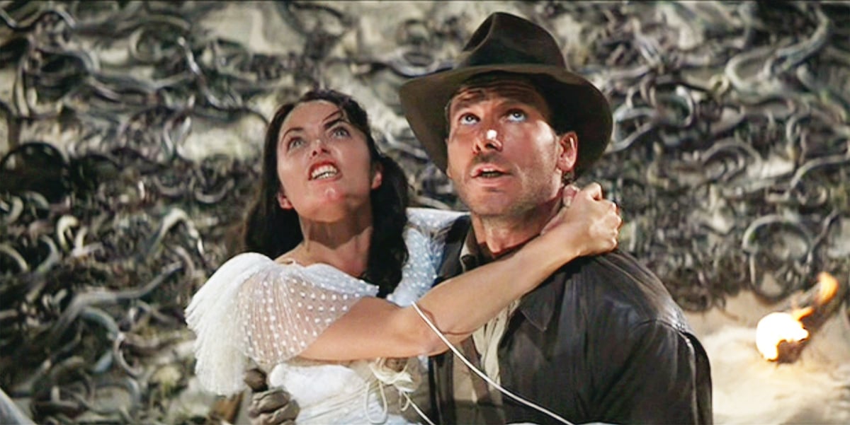 Karen Allen as Marion Ravenwood and Harrison Ford as Indiana Jones in 