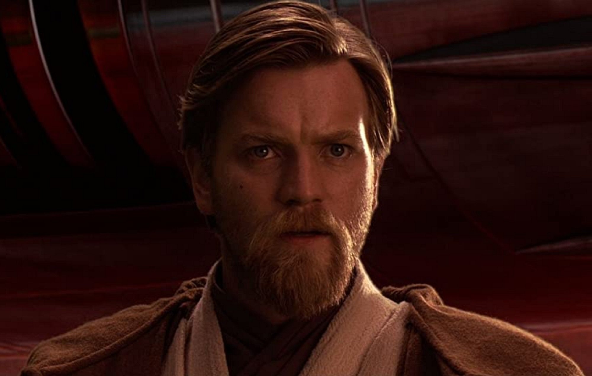 Star Wars Kenobi spoilers focus on Ewan McGregor as Obi-Wan Kenobi, pictured here looking concerned, in brown Jedi robes