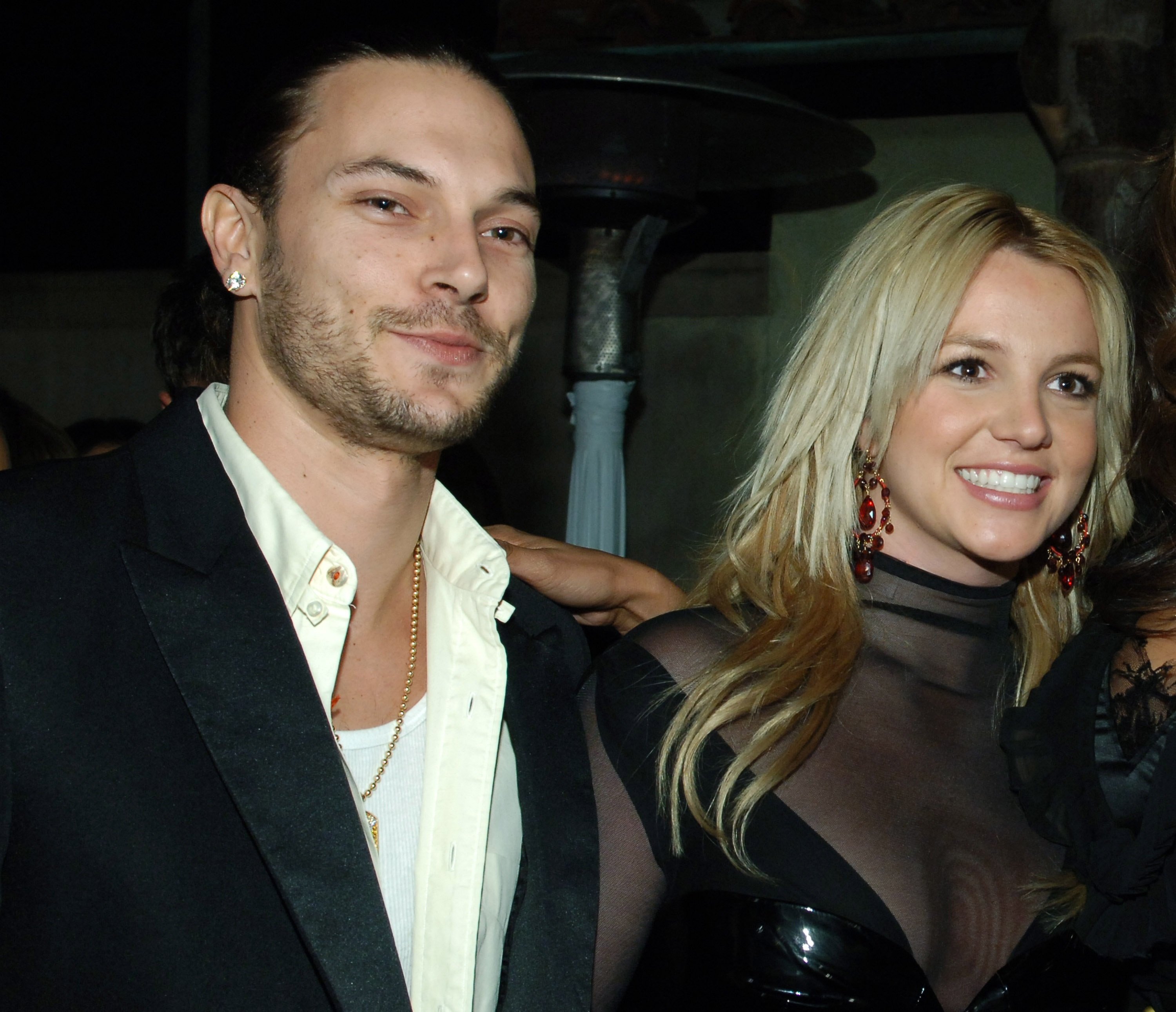Kevin Federline and Britney Spears smiling for the media at a Grammy after party in 2006