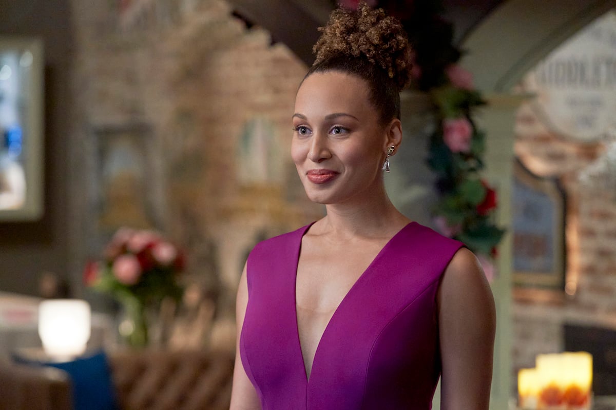 Kyana Teresa as Zoey wearing a sleeveless purple dress in 'Good Witch' series finale