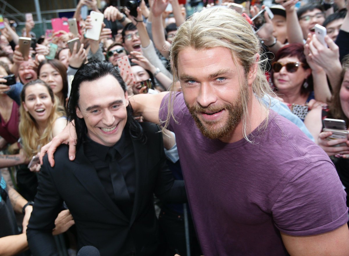 Tom Hiddleston and Chris Hemsworth meet fans whilst on set filming 'Thor: Ragnarok'. They're in costume as Loki and Thor