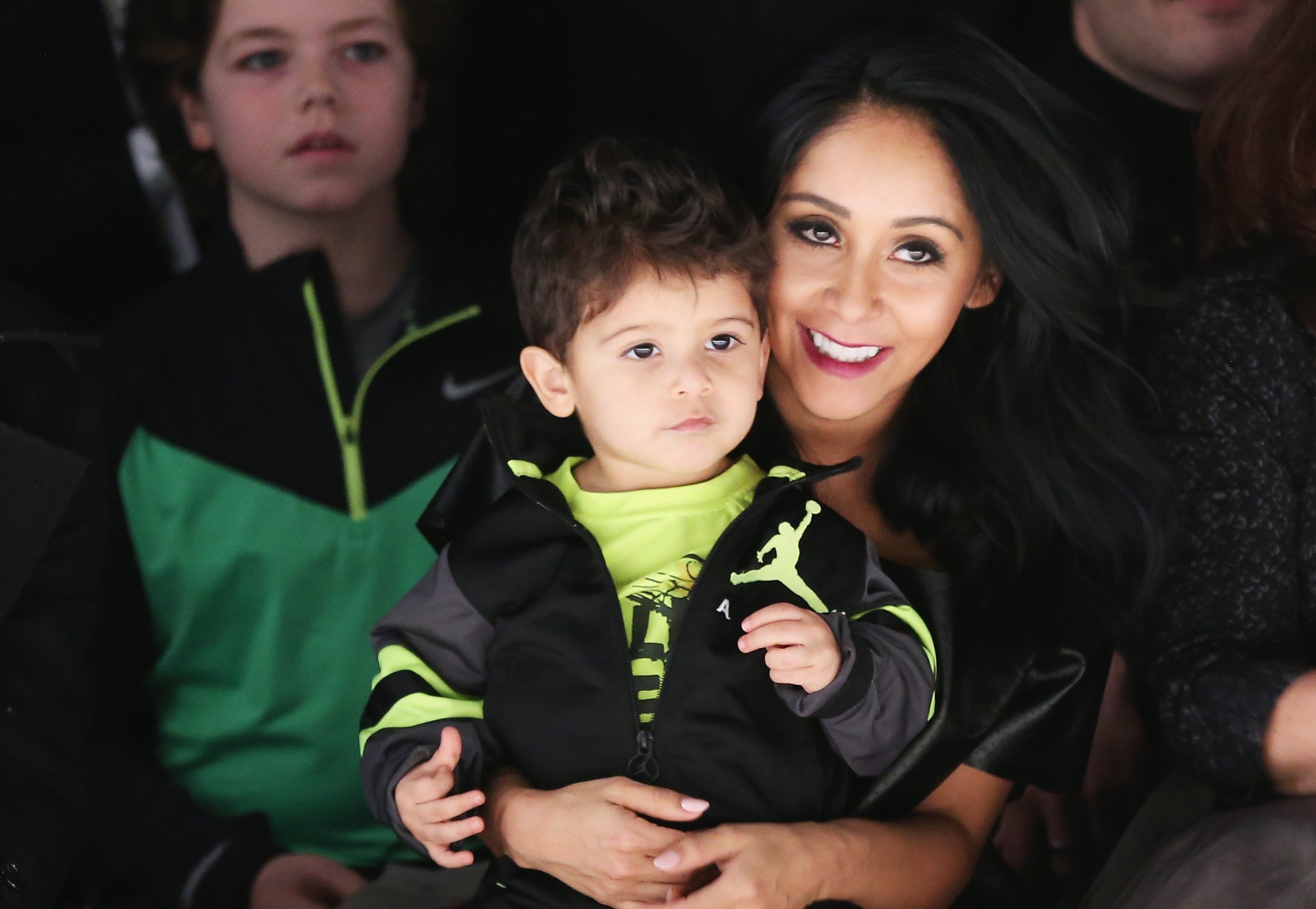 Nicole 'Snooki' Polizzi holding one of her kids, Lorenzo LaValle, in February 2015