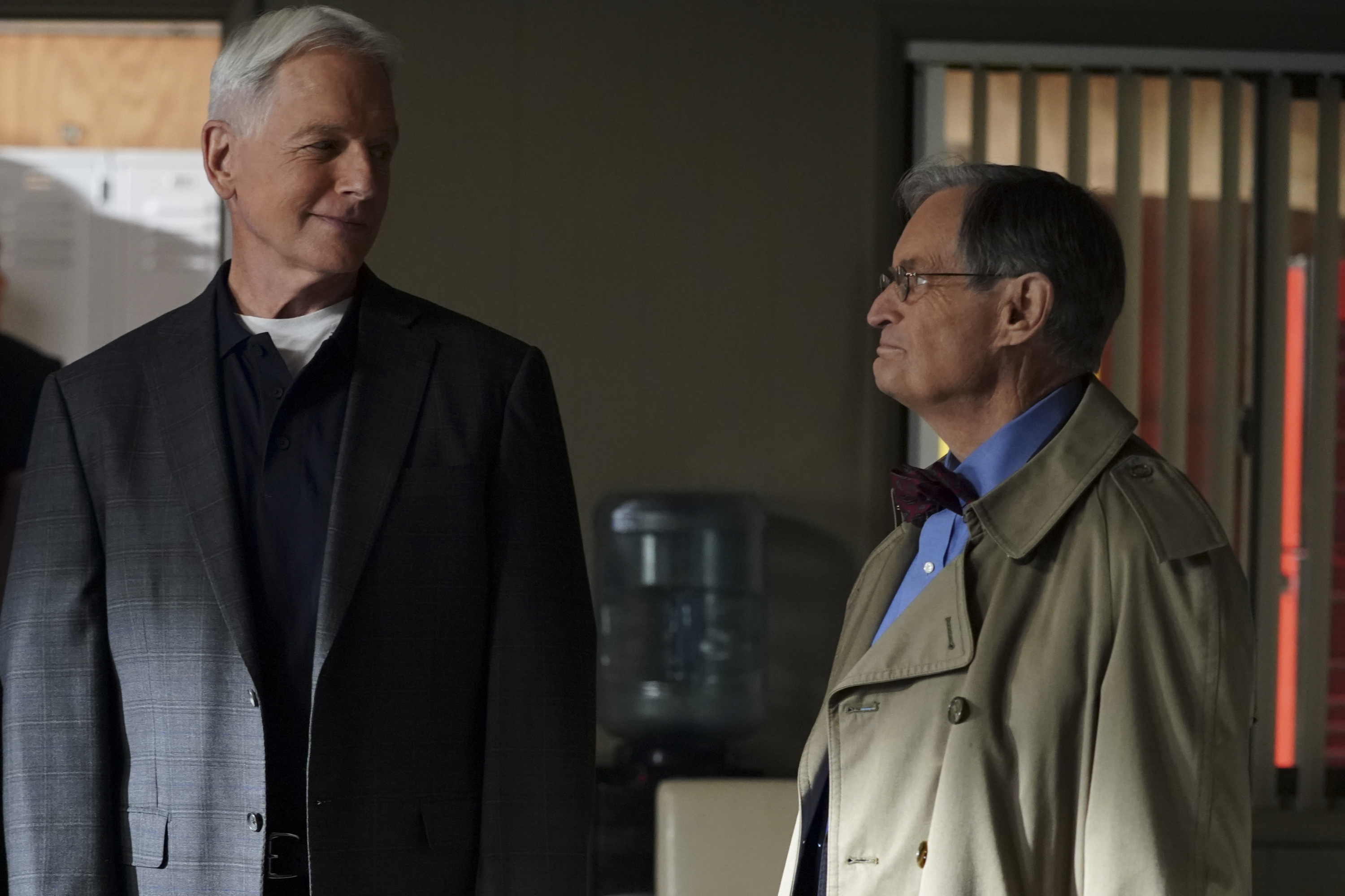 Mark Harmon and David McCallum stand next to each other during a scene from NCIS. 