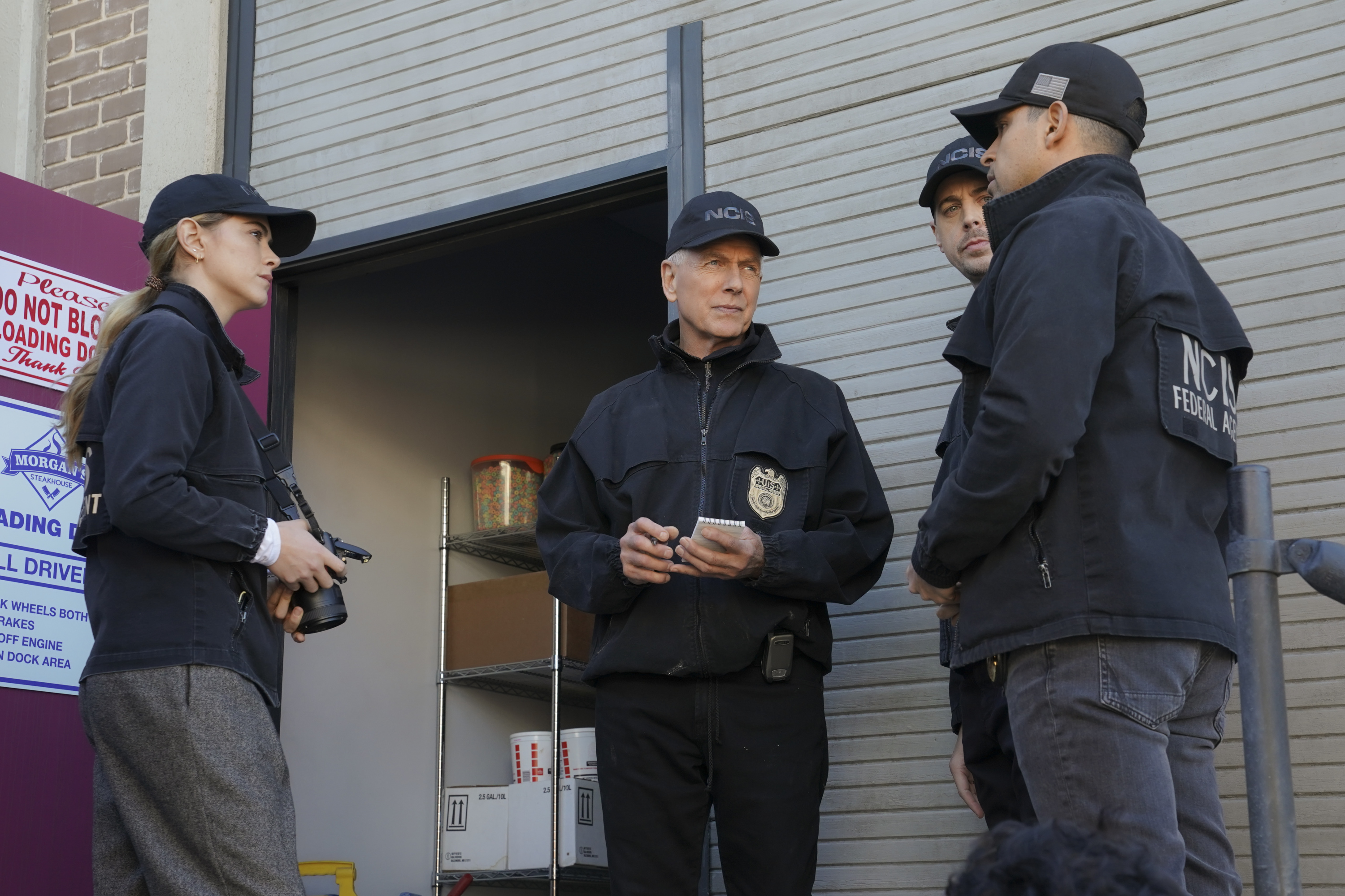 Mark Harmon with the NCIS team 