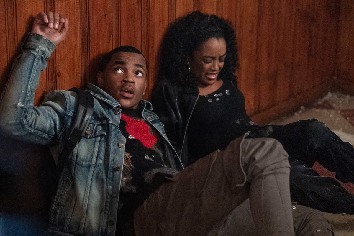 Michael Rainey Jr and LaToya Tonodeo hovering on the floor in fear as Tariq St. Patrick and Diana Tejada in ''Power Book II: Ghost"