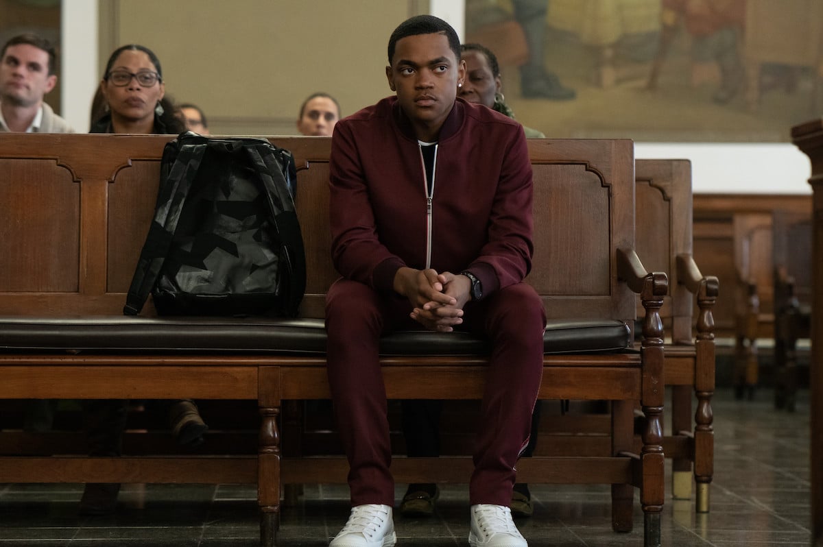 Michael Rainey Jr. sitting on a court bench as Tariq St. Patrick in 'Power Book II: Ghost'