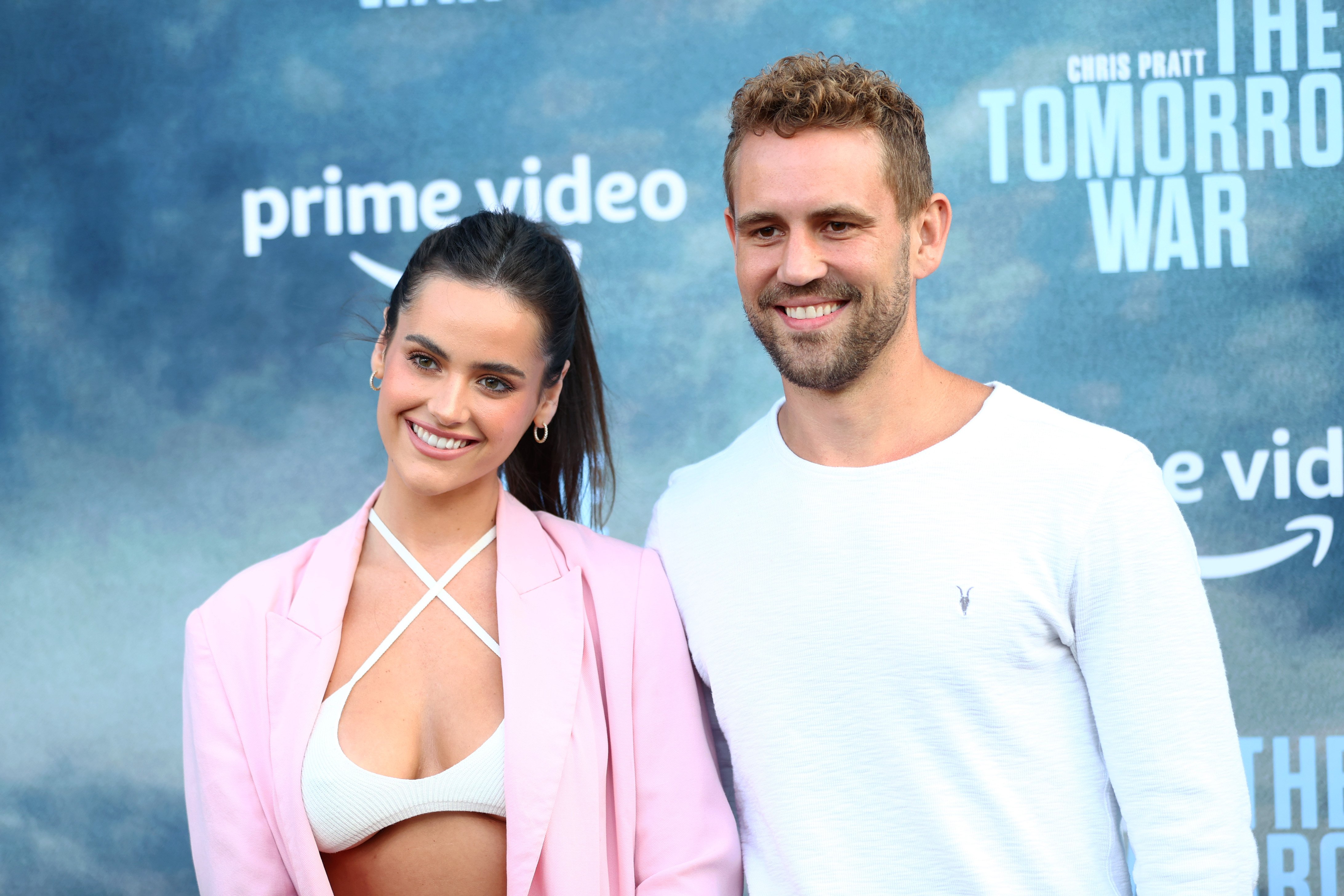 Natalie Joy and Nick Viall pose for photos in Los Angeles for the premiere of "The Tomorrow War."