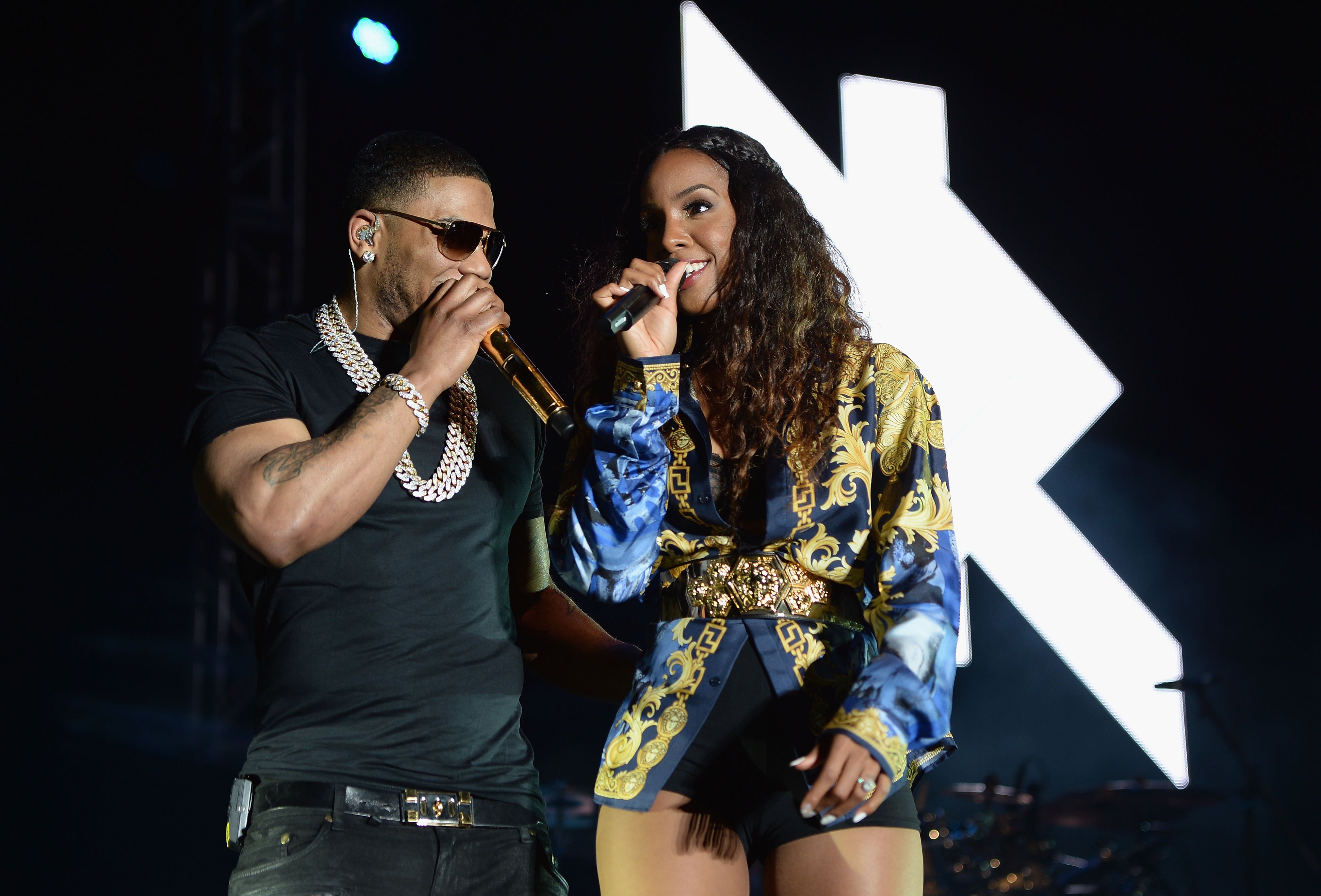 Nelly and Kelly Rowland perform onstage together in Miami