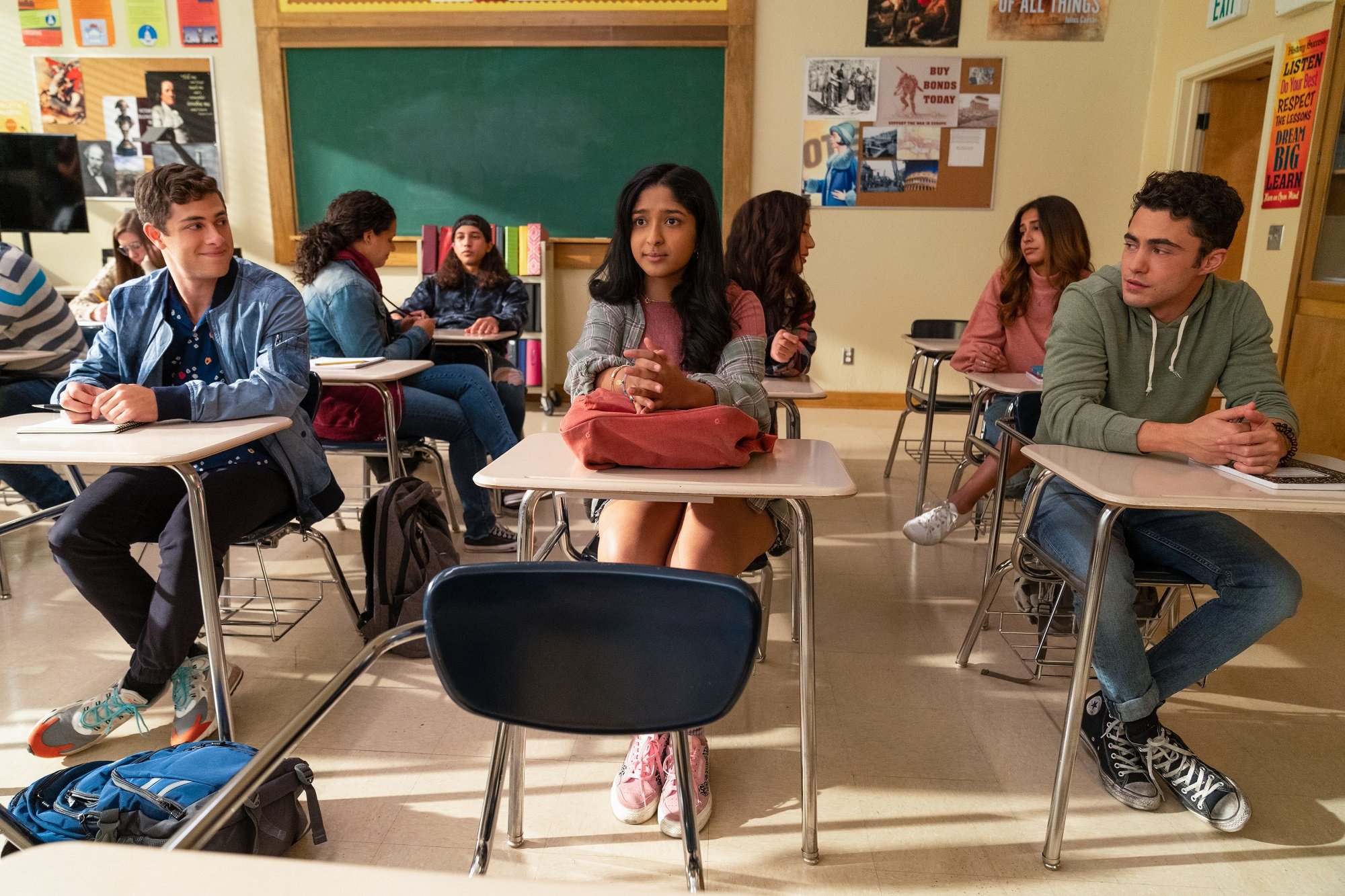 Ben Gross, Devi Vishwakumar, and Paxton Hall-Yoshida sit in a classroom in 'Never Have I Ever'