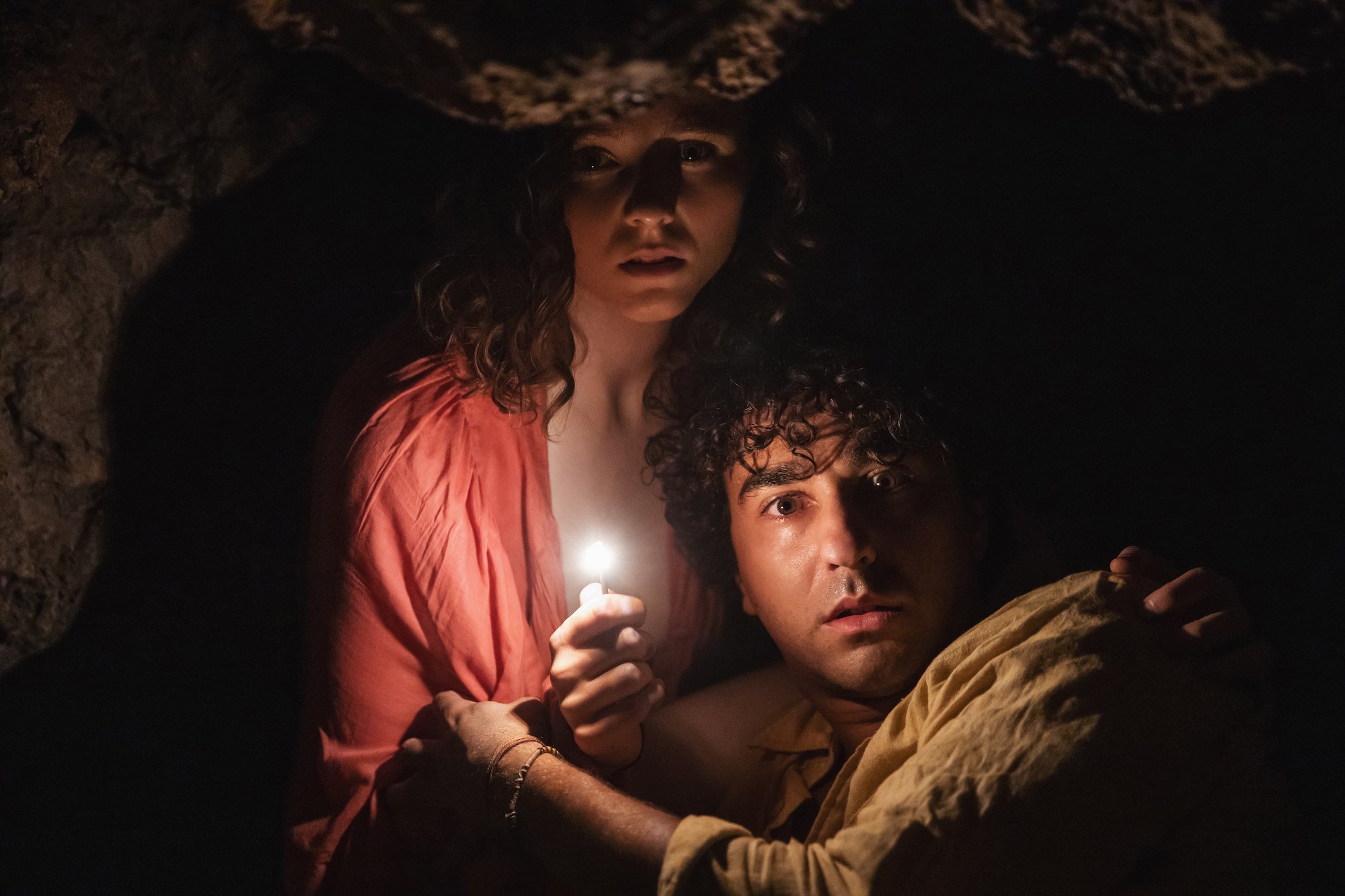 Old stars Thomasin McKenzie and Alex Wolff in a cave