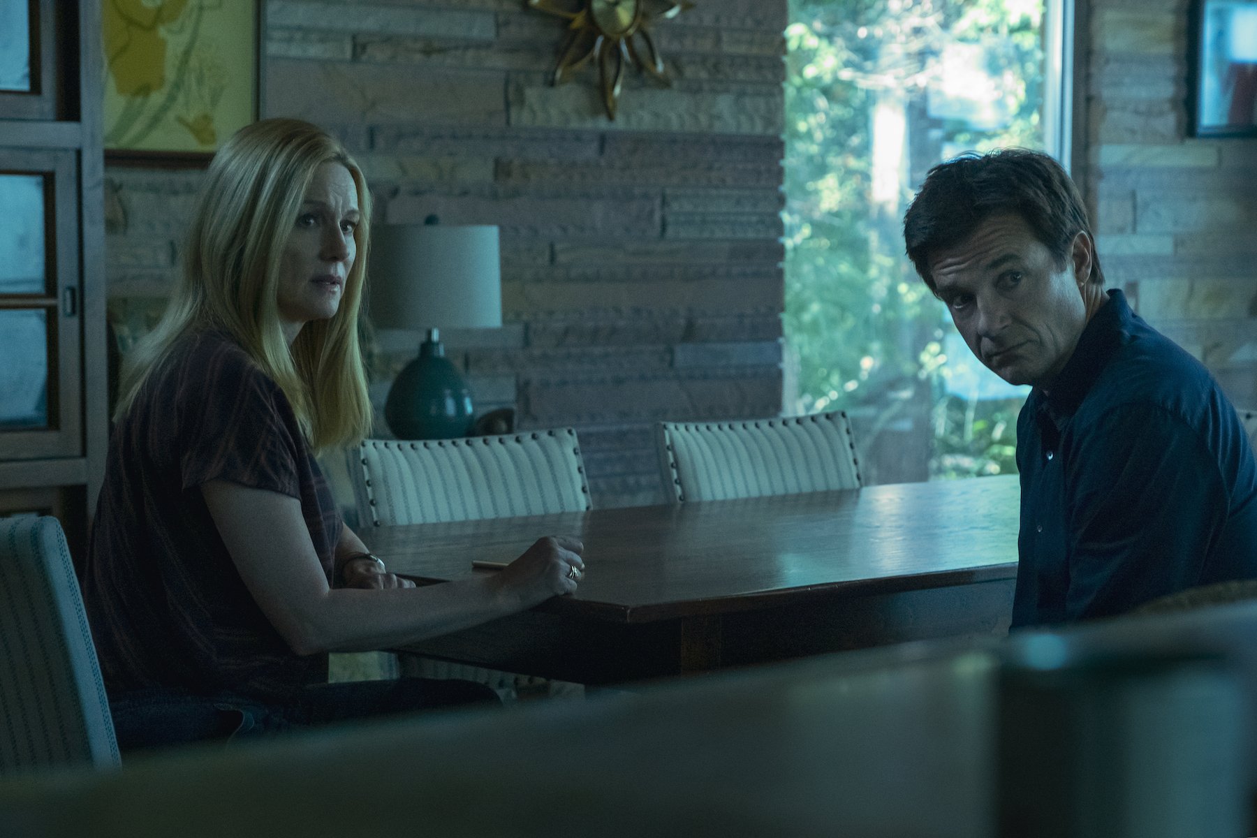 Marty and Wendy Byrde, the protagonists of 'Ozark' Season 4, sitting next to each other in 'Ozark' Season 3