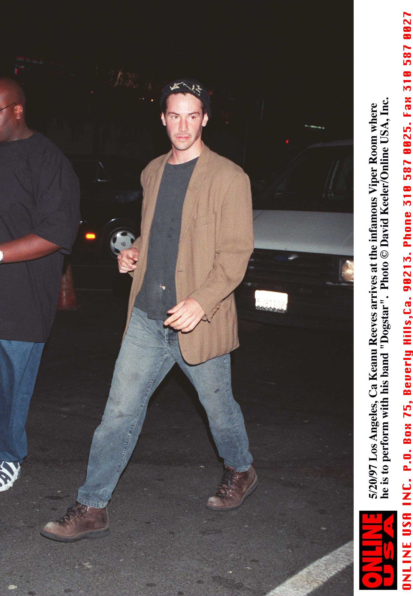 Paparazzi shot of Keanu Reeves entering the Viper Room