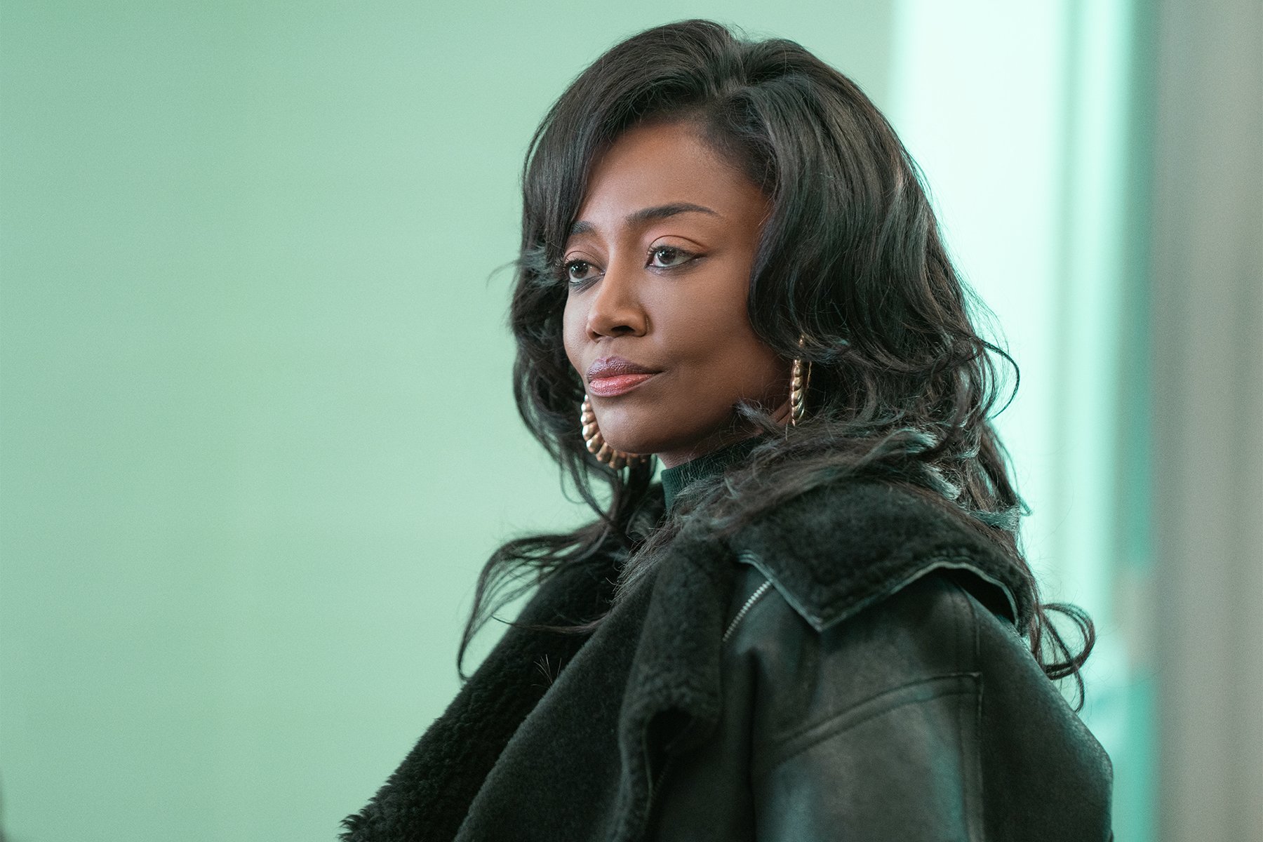 Patina Miller wearing a fur coat and gold earrings as Raquel 'Raq' Thomas in a scene for 'Power Book III: Raising Kanan'