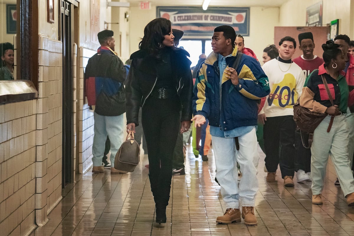 Patina Miller as Raquel "Raq" Thomas and Mekai Curtis as Kanan Stark in 'Power Book III: Raising Kanan' walking down a highschool hallway 