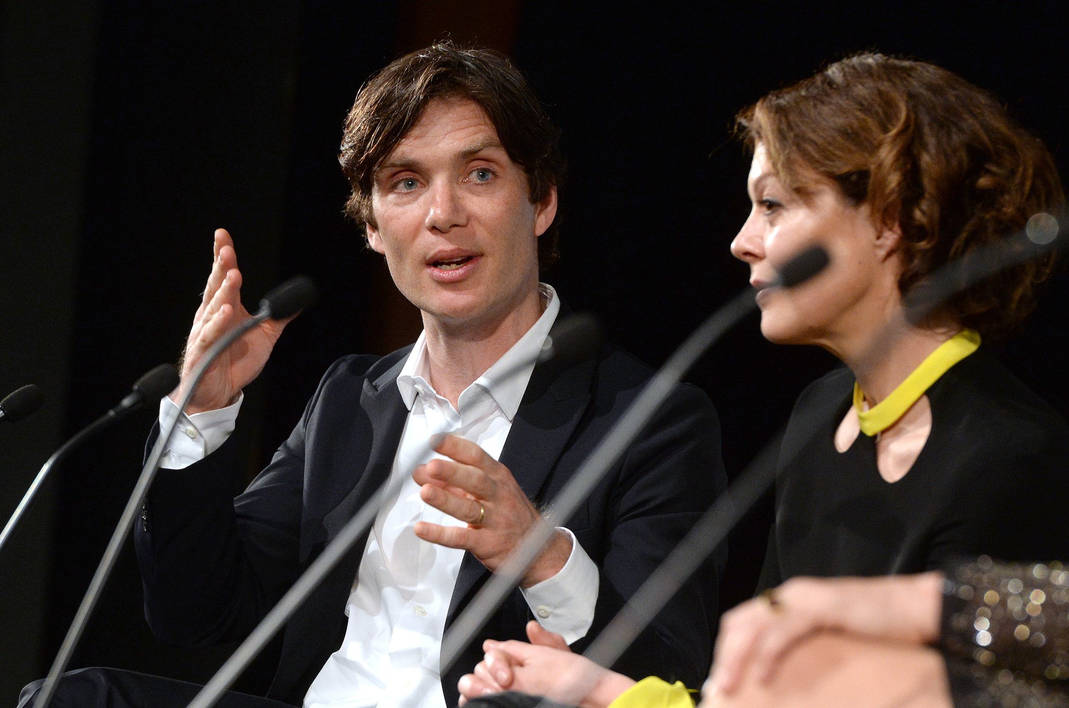 Cillian Murphy from 'Peaky Blinders' Season 6 answering questions next to Helen McCrory