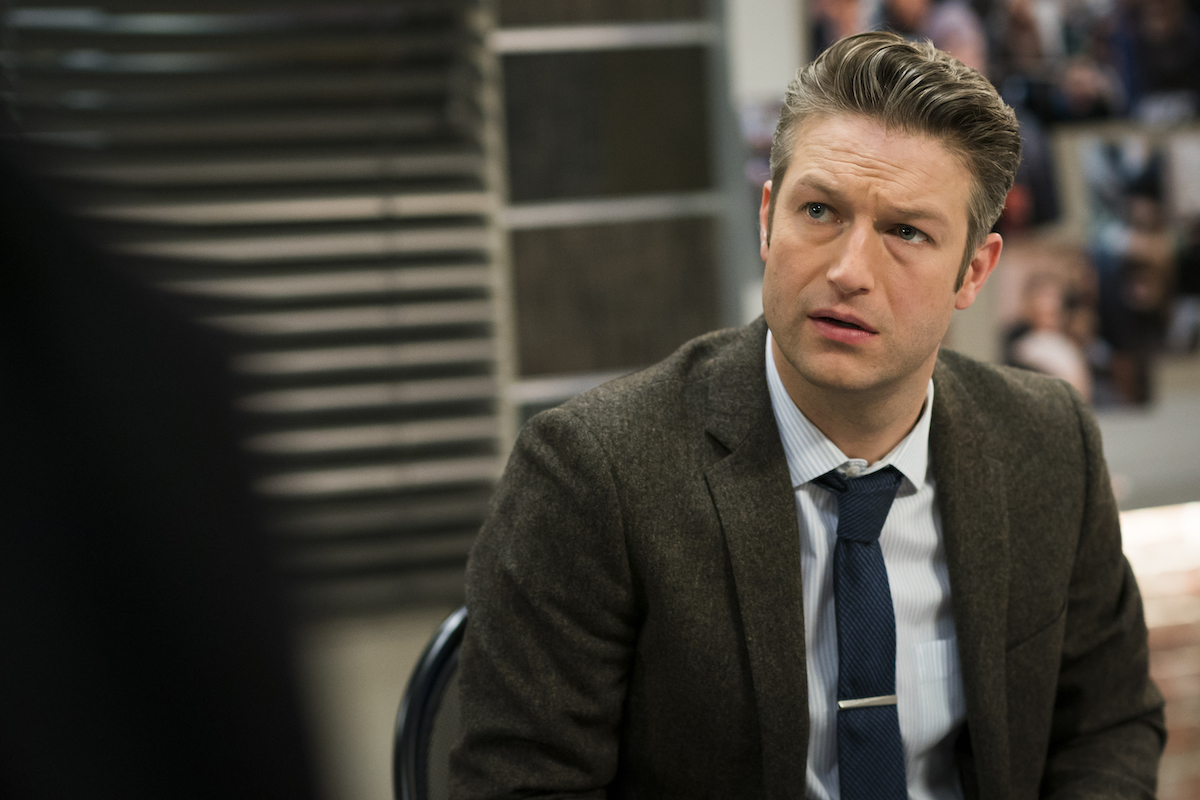 Peter Scanavino as Dominick Carisi Jr sitting down in 'Law & Order: SVU'