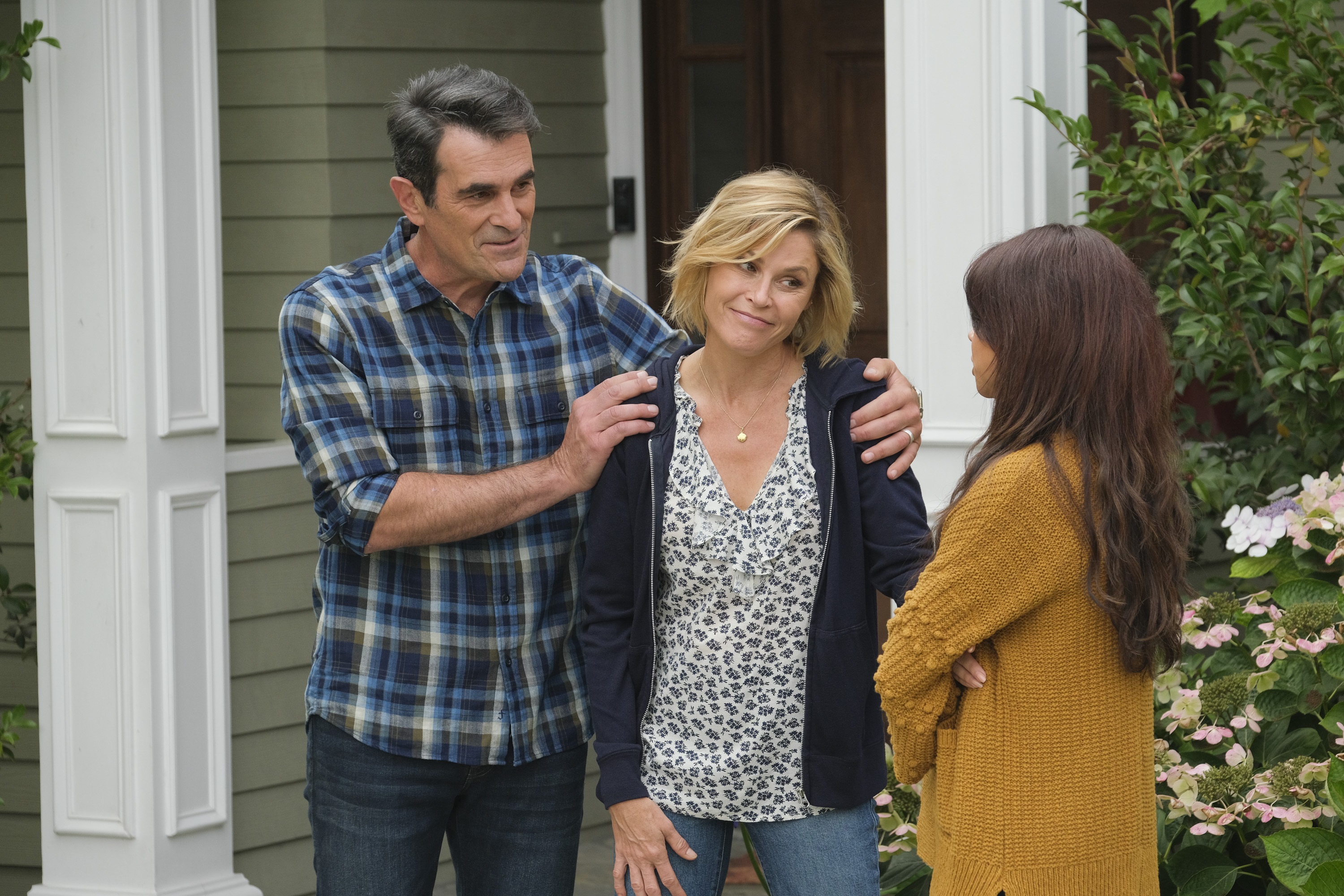 Modern Family Ty Burrell as Phil Dunphy, Julie Bowen as Claire and Sarah Hyland as Haley