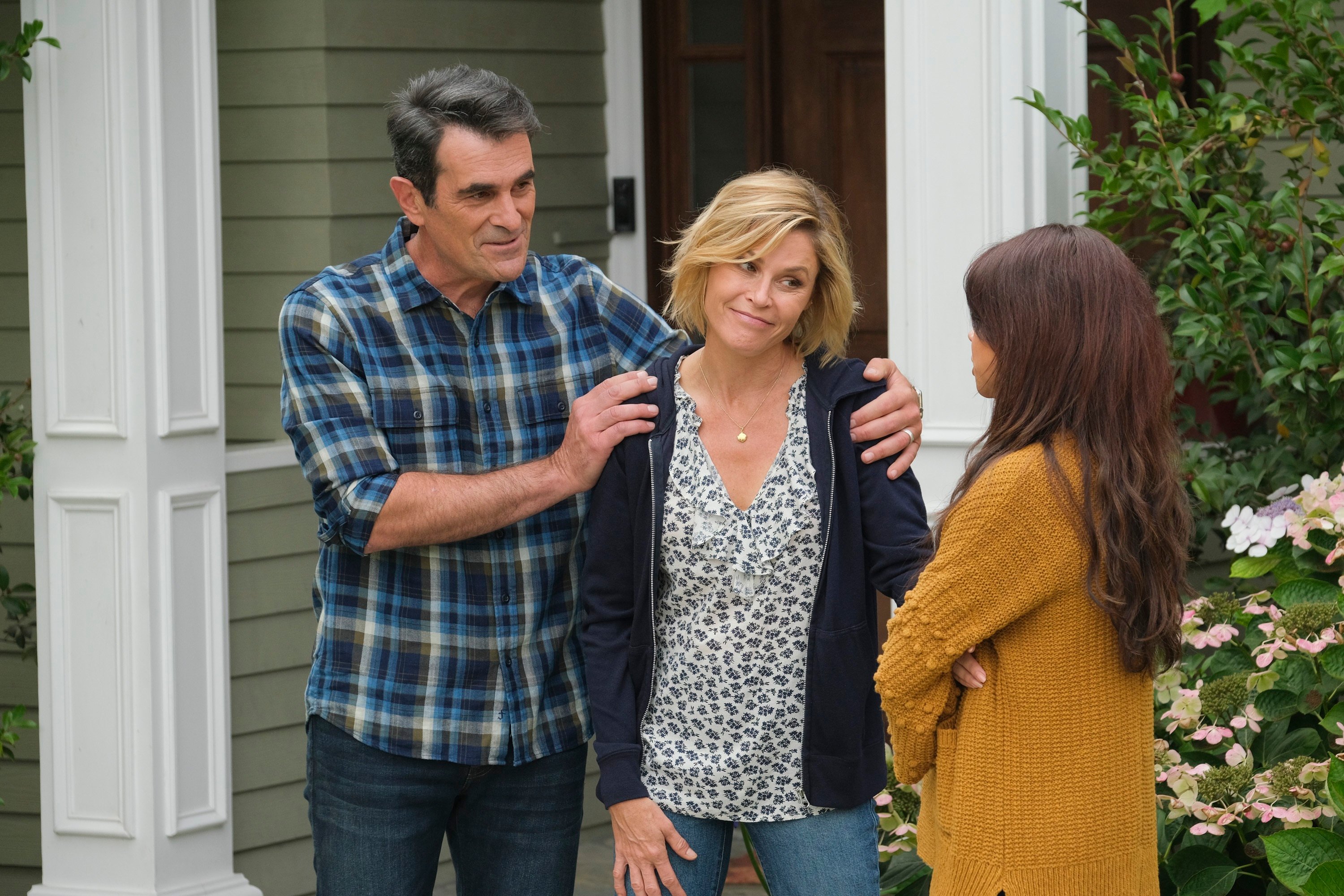 Modern Family Ty Burrell as Phil Dunphy, Julie Bowen as Claire and Sarah Hyland as Haley