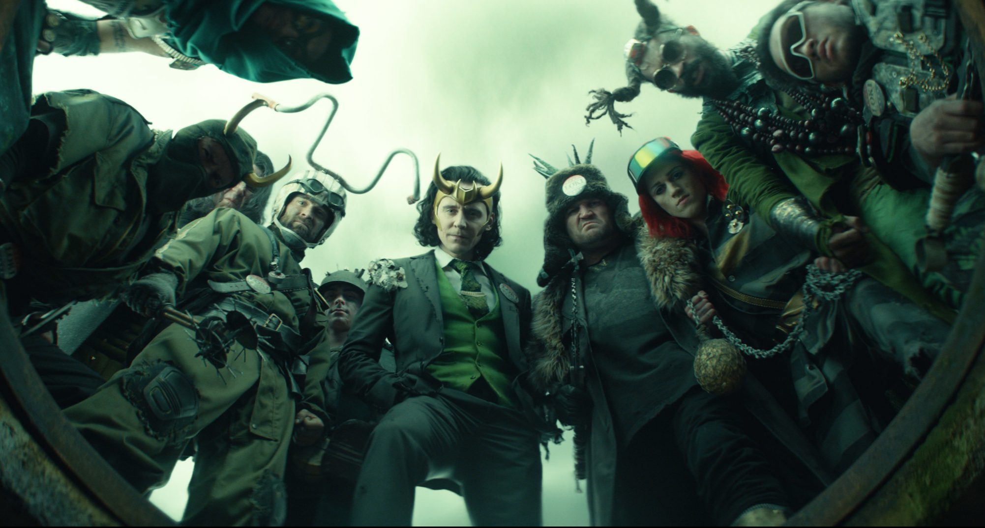 Tom Hiddleston as President Loki surrounded by Loki variants