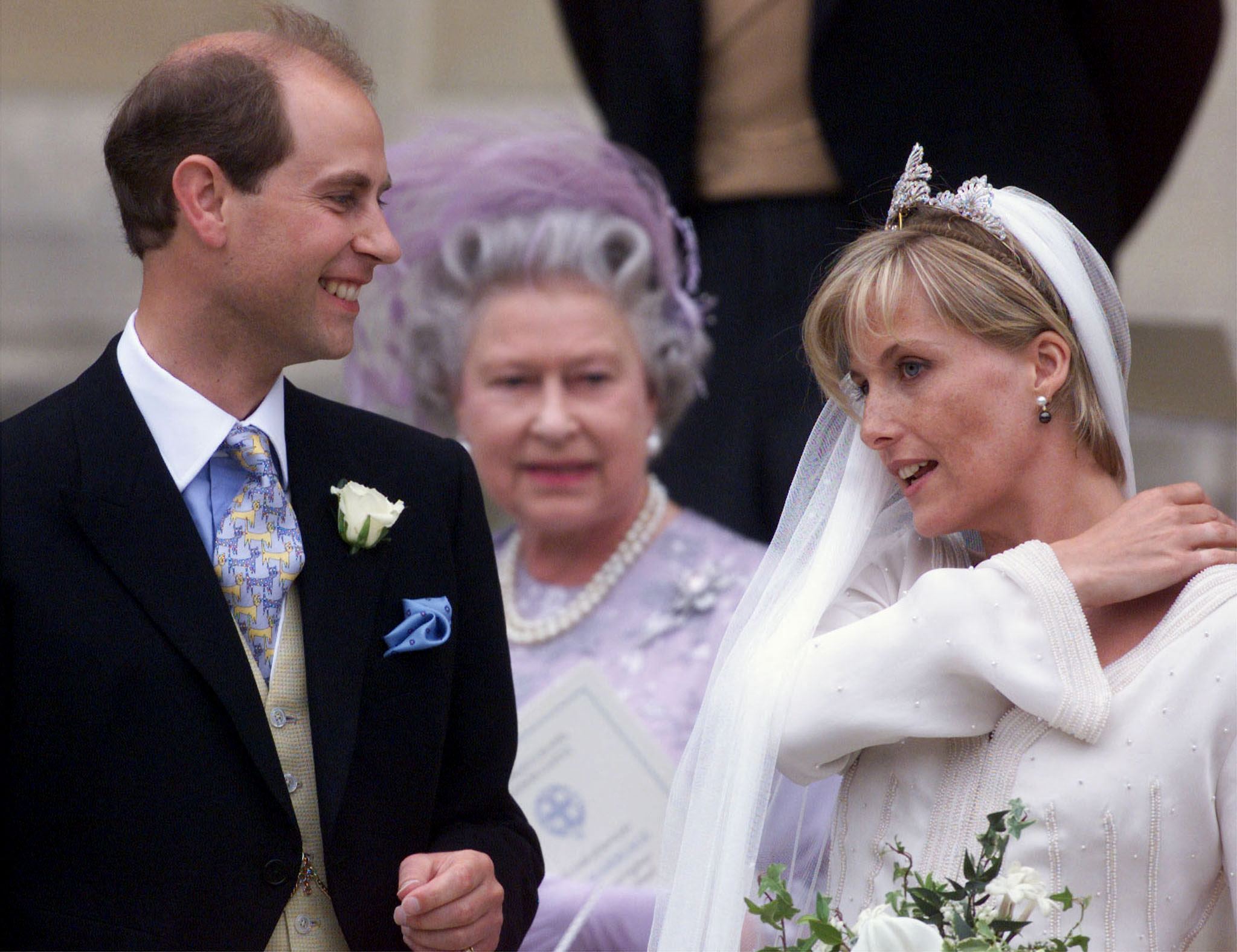 Prince Edward and wife Sophie, with Queen Elizabeth in the background