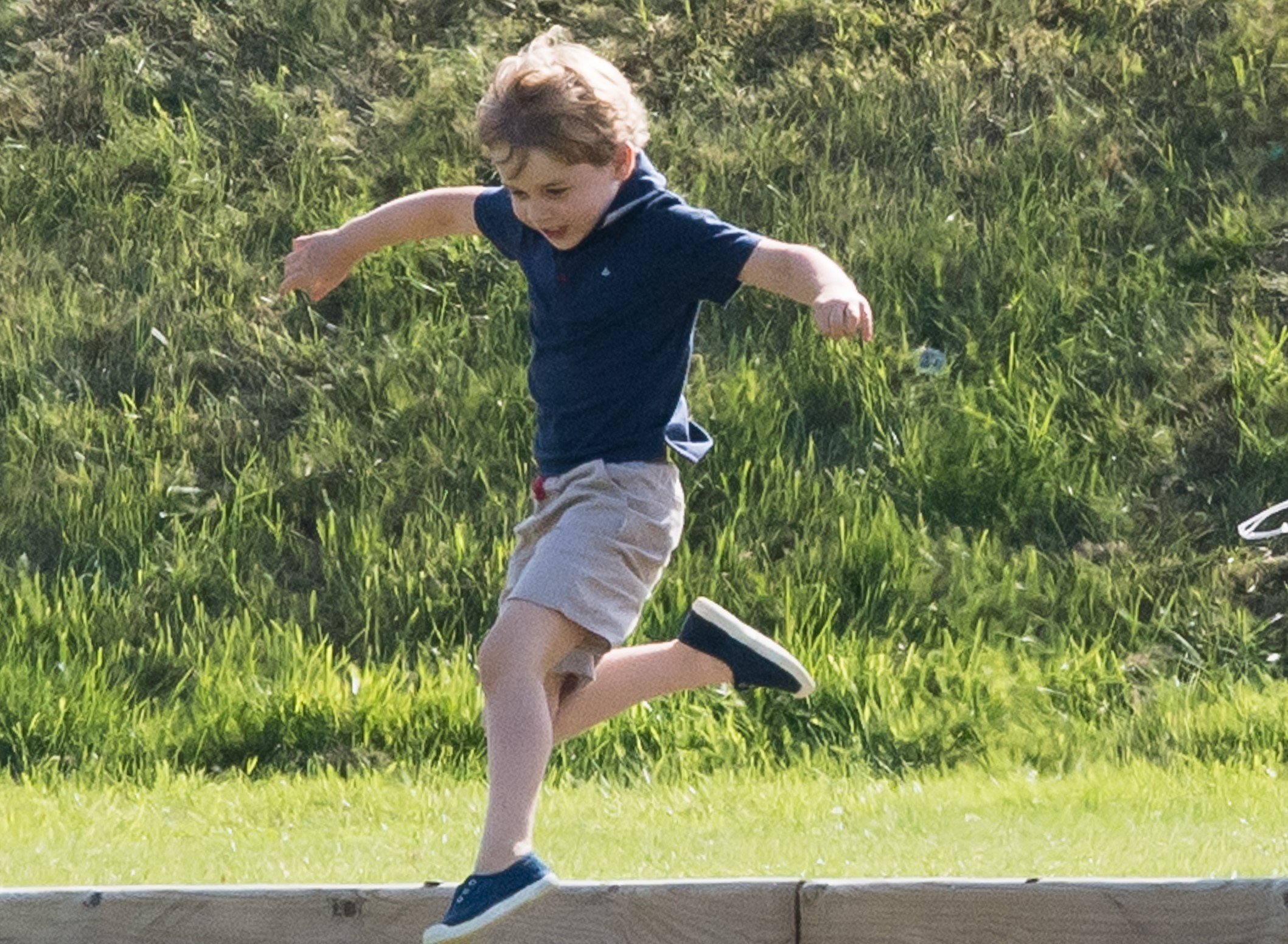 Prince George playing and leaping in the air at Maserati Royal Charity Polo Trophy