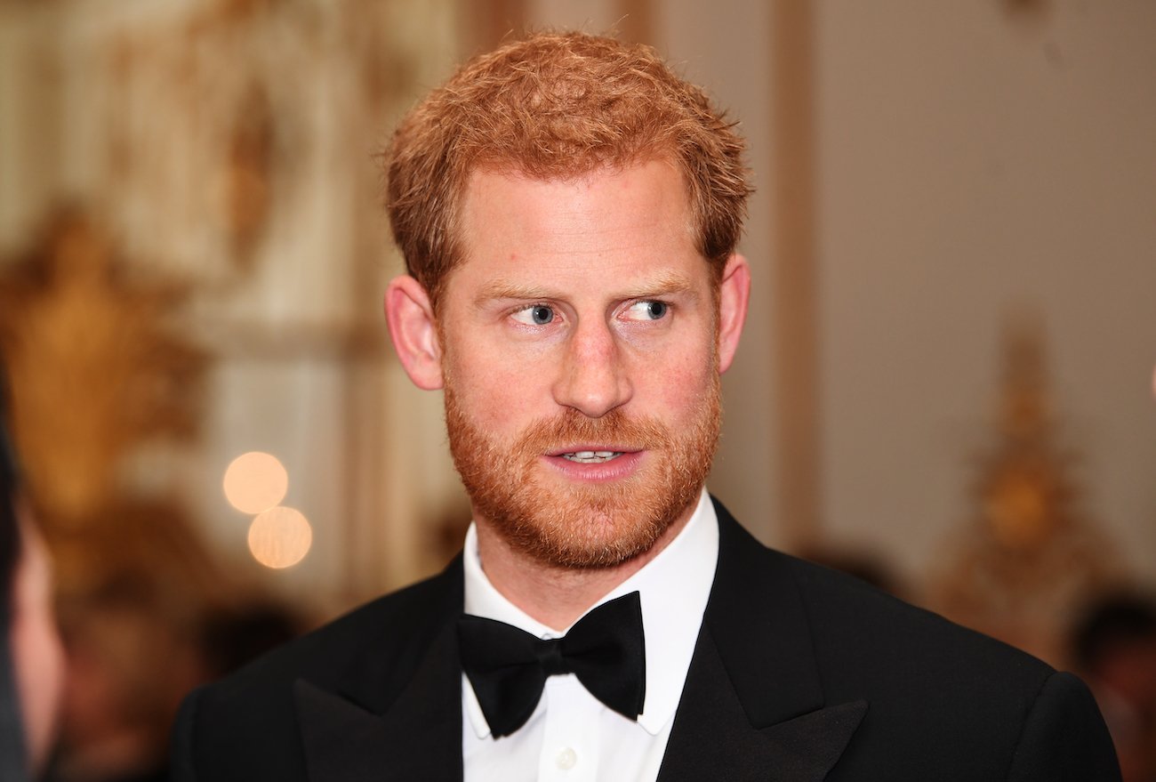 Prince Harry wearing black bowtie, looking off-camera