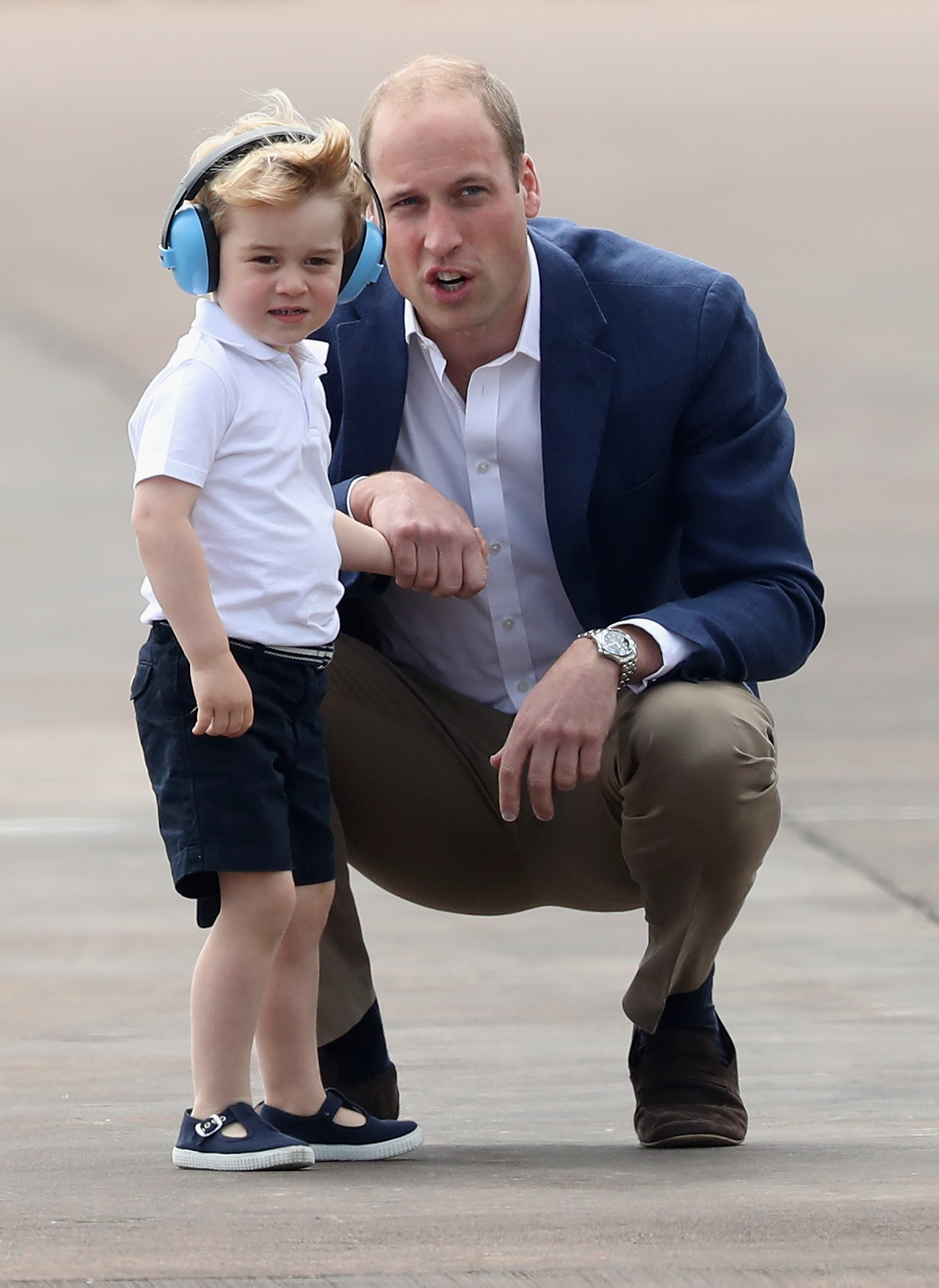 Prince William and Prince George photographed during a visit to the Royal International Air Tattoo