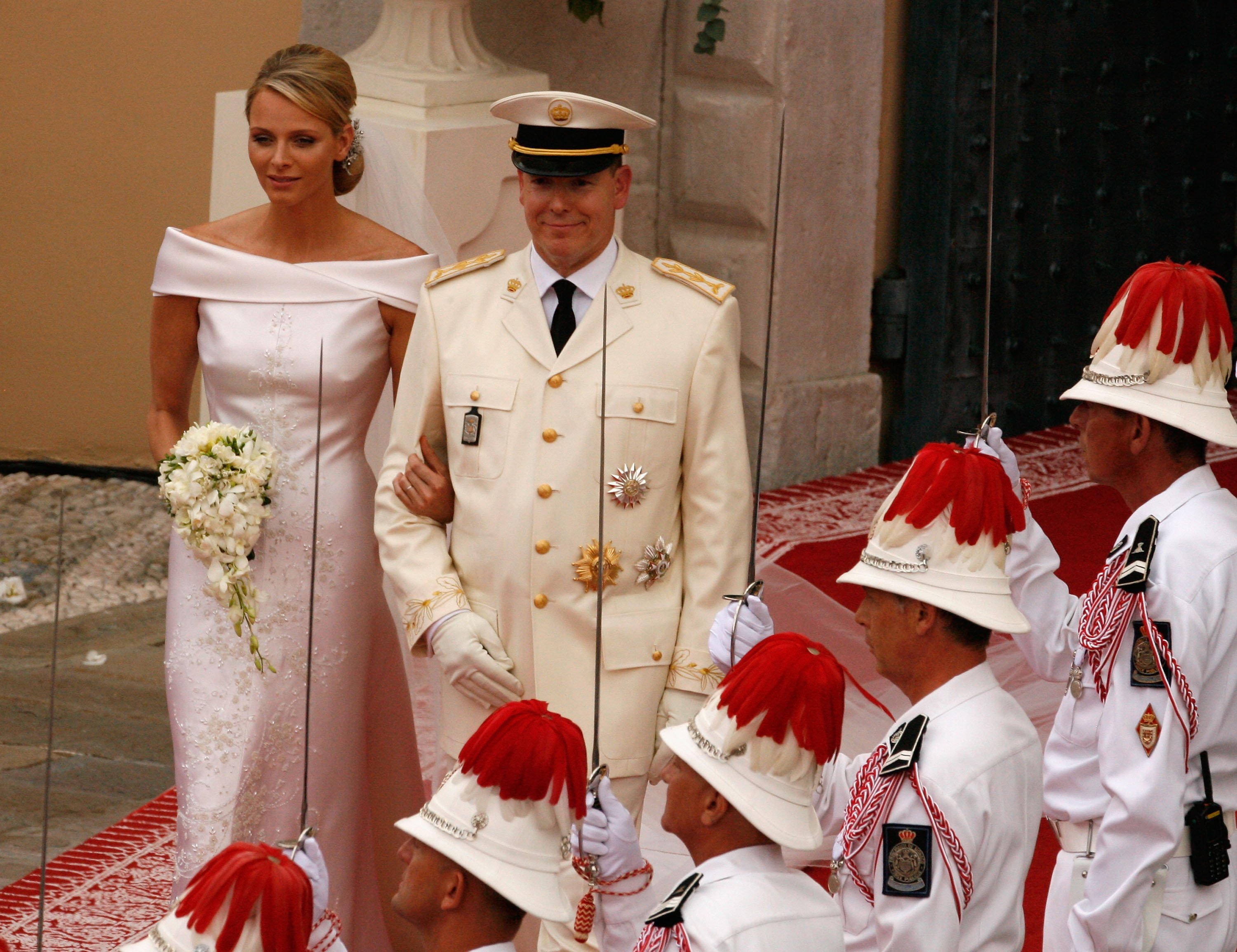 Princess Charlene of Monaco and Prince Albert II of Monaco leave ceremony on their wedding day