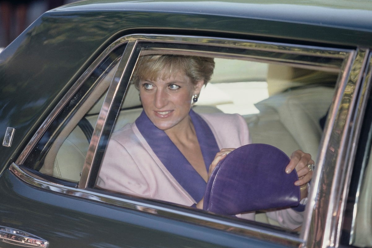 Princess Diana traveling in a car for a visit to a center for children with HIV in Washington, D.C.