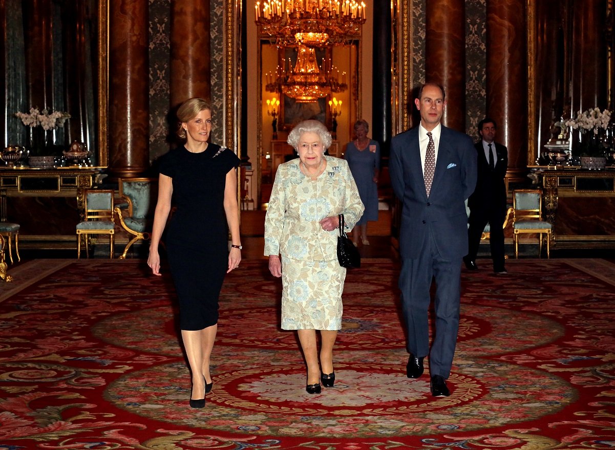 Queen Elizabeth II with Sophie, Countess of Wessex and Prince Edward during reception at Buckingham Palace