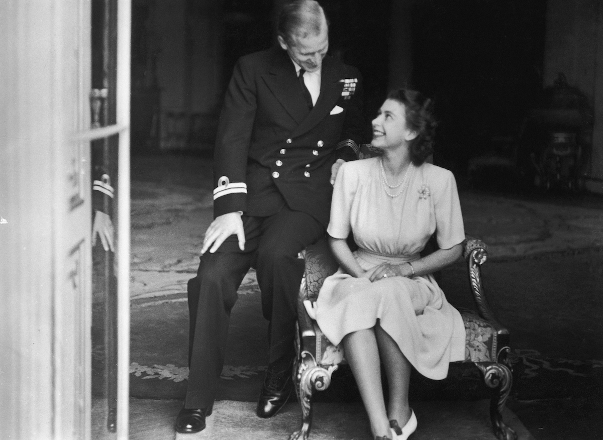 Princess Elizabeth (later Queen Elizabeth II) and her fiance, Philip Mountbatten at Buckingham Palace, after their engagement was announced, 10th July 1947.
