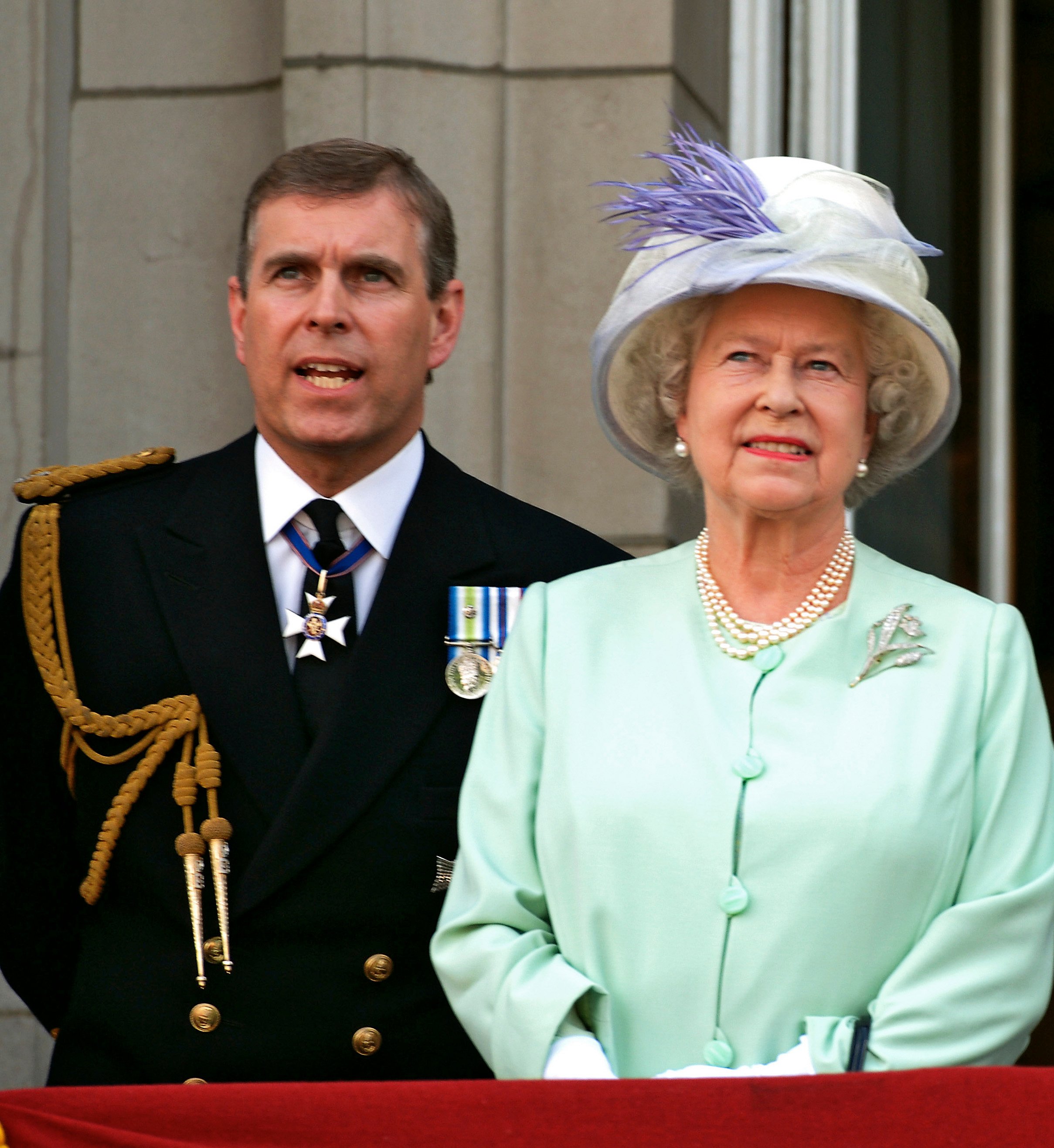 Queen Elizabeth ll and Prince Andrew watch the flypast on the balcony of Buckingham Palace
