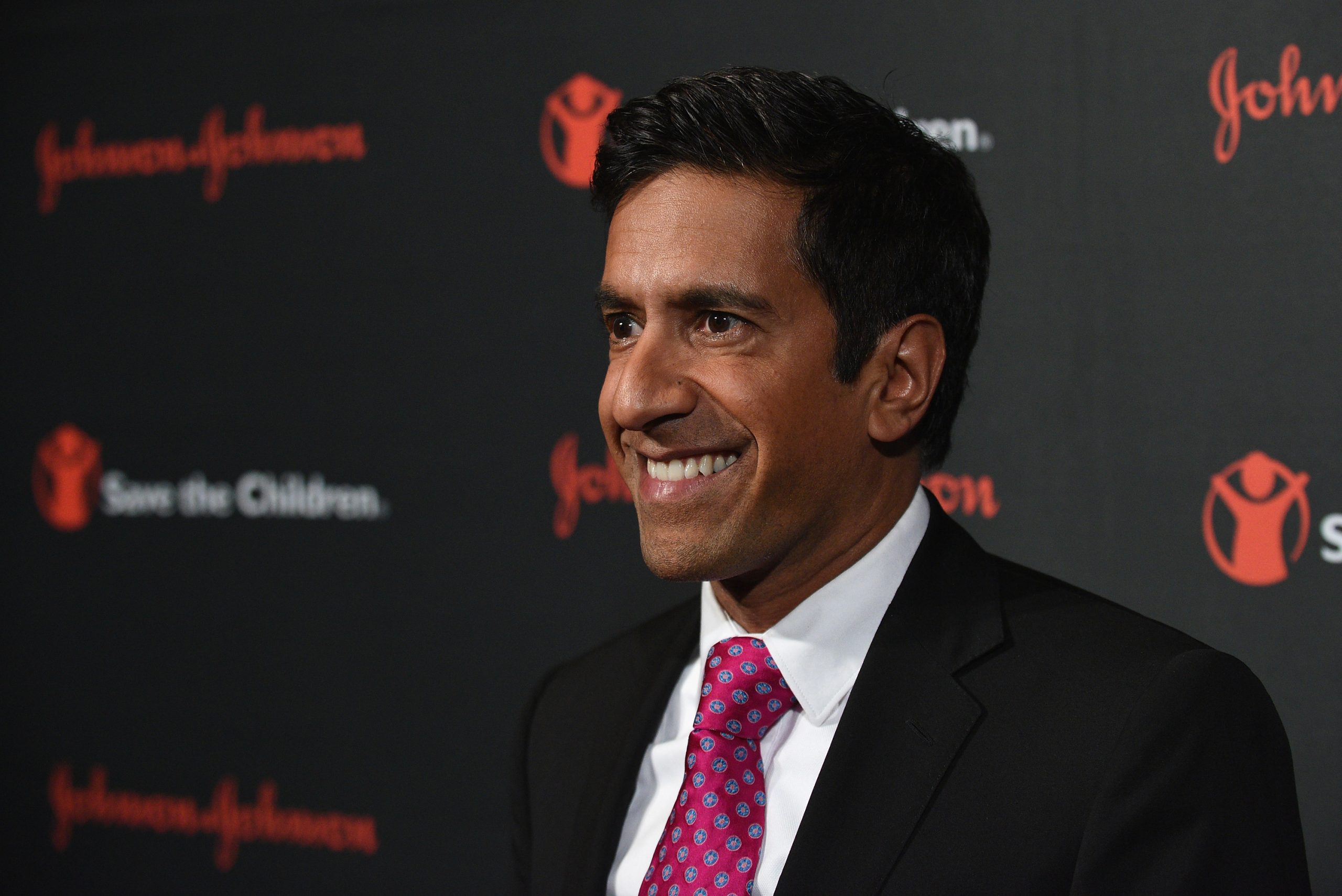 CNN's Dr. Sanjay Gupta smiles as he attends an event in 2015.