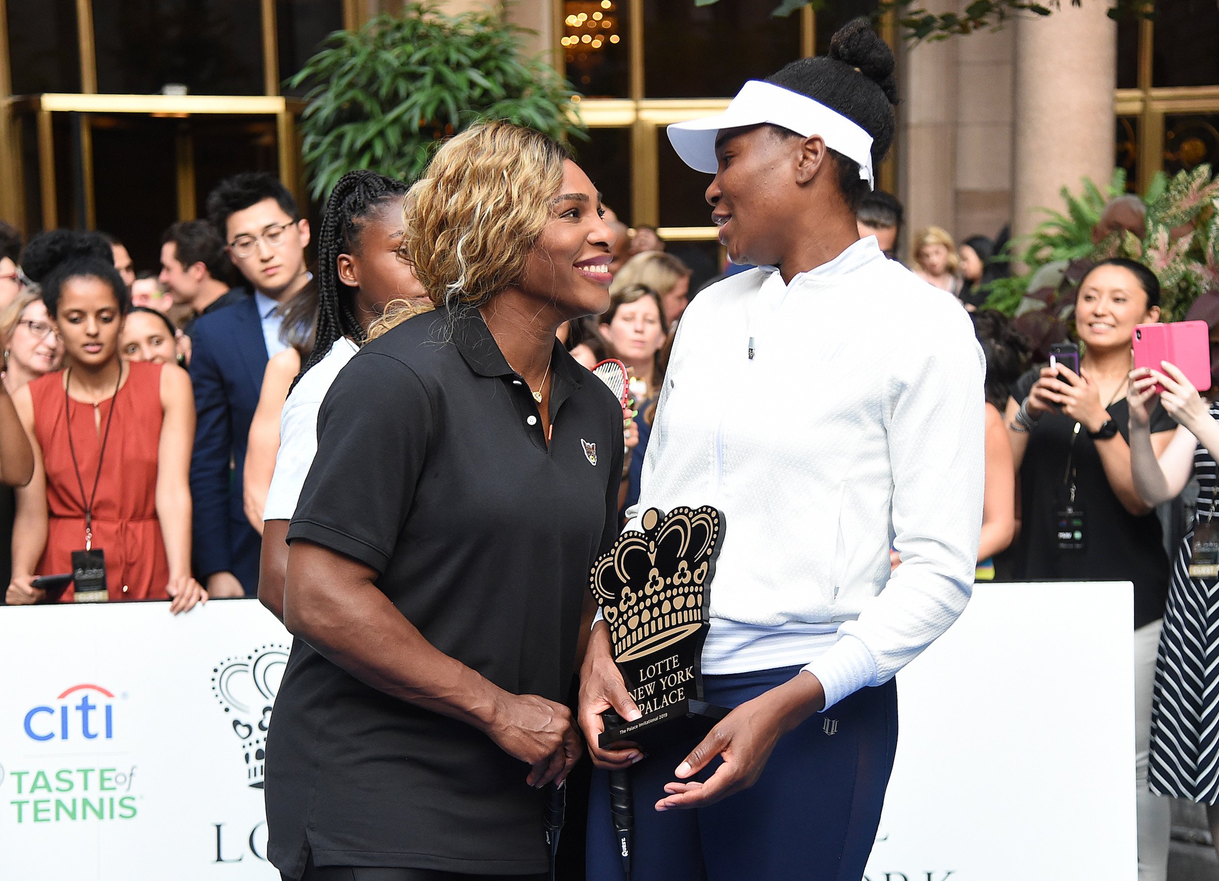 Serena Williams and Venus Williams attend the 2019 Palace Invitational. Venus Williams' height makes her stand taller over Serena Williams.