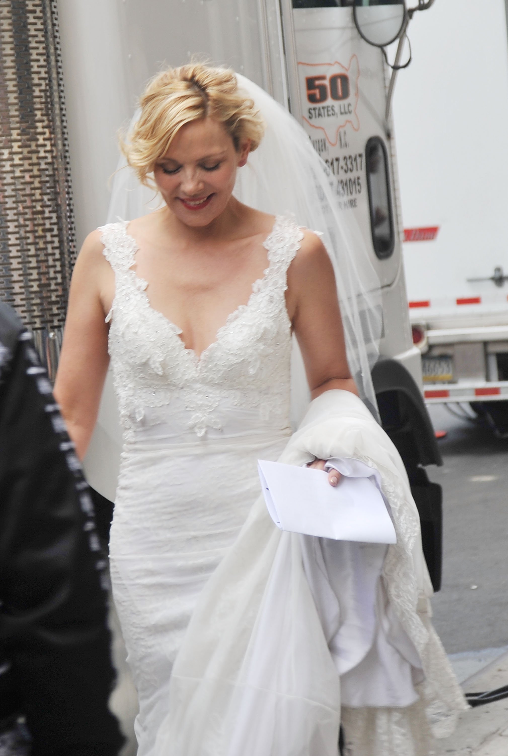 Kim Cattrall as Samantha Jones walks down a Manhattan street in a wedding dress during the filming of 'Sex and the City 2'