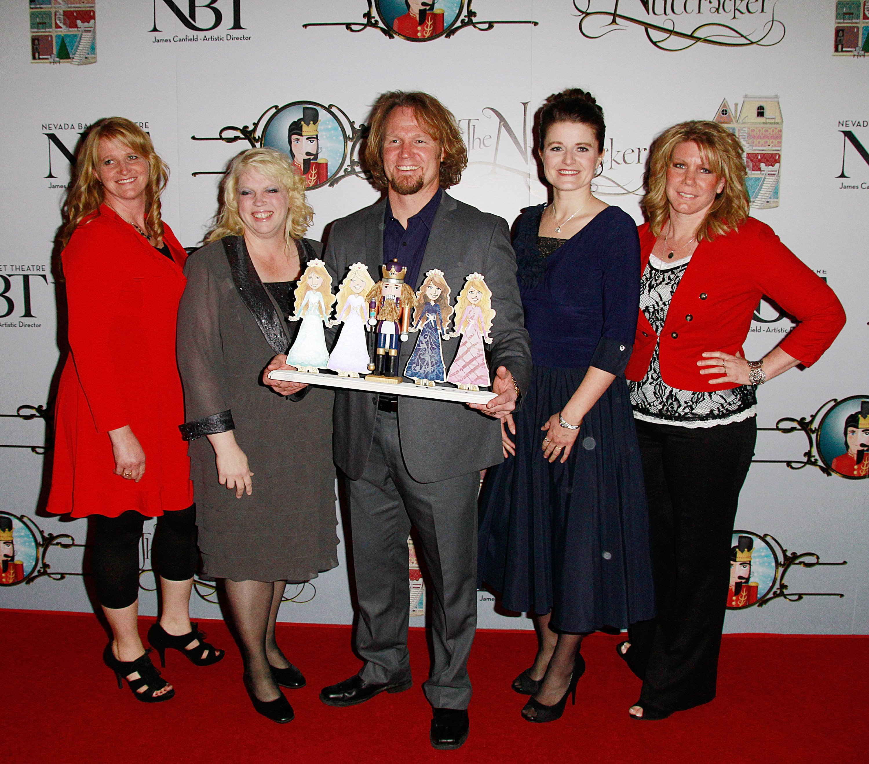 'Sister Wives' stars, Christine Brown, Janelle Brown, Kody Brown, Robyn Brown and Meri Brown pose for a photo at the opening of 'The Nutcracker' in Las Vegas