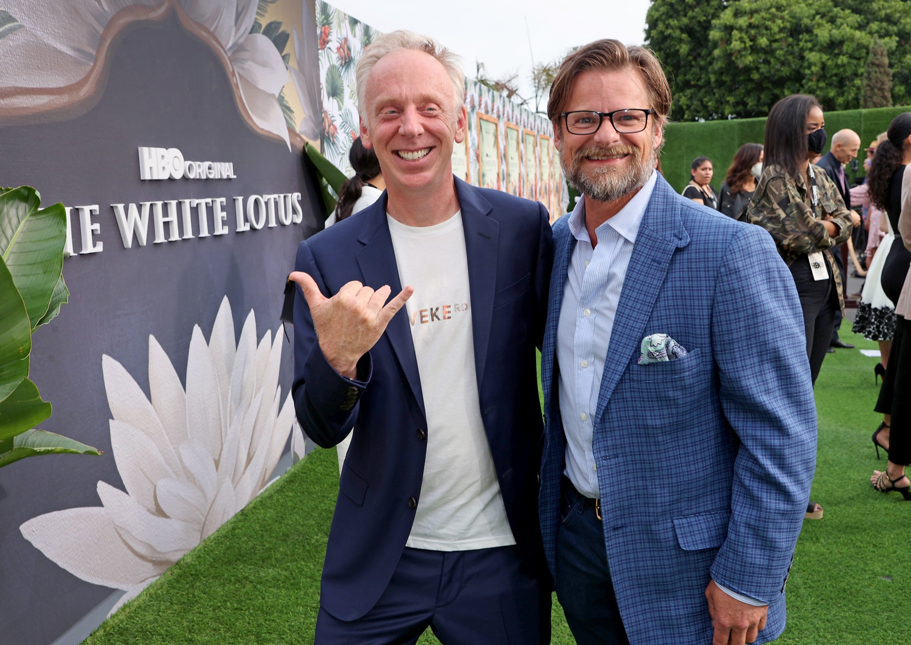 Director Mike White and actor Steve Zahn smiling for photographers at The White Lotus premiere