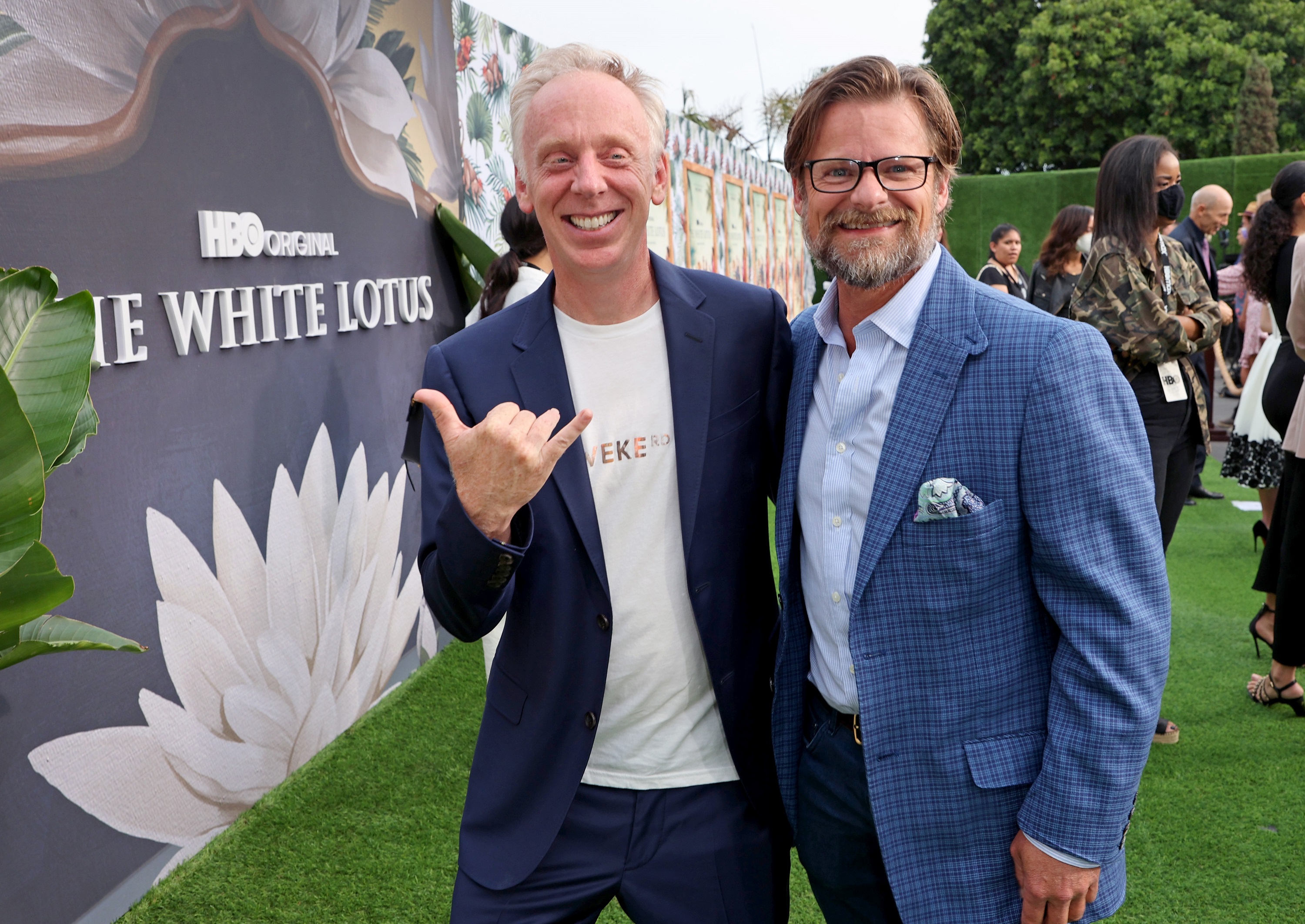 Director Mike White and actor Steve Zahn smiling for photographers at The White Lotus Season 1 premiere