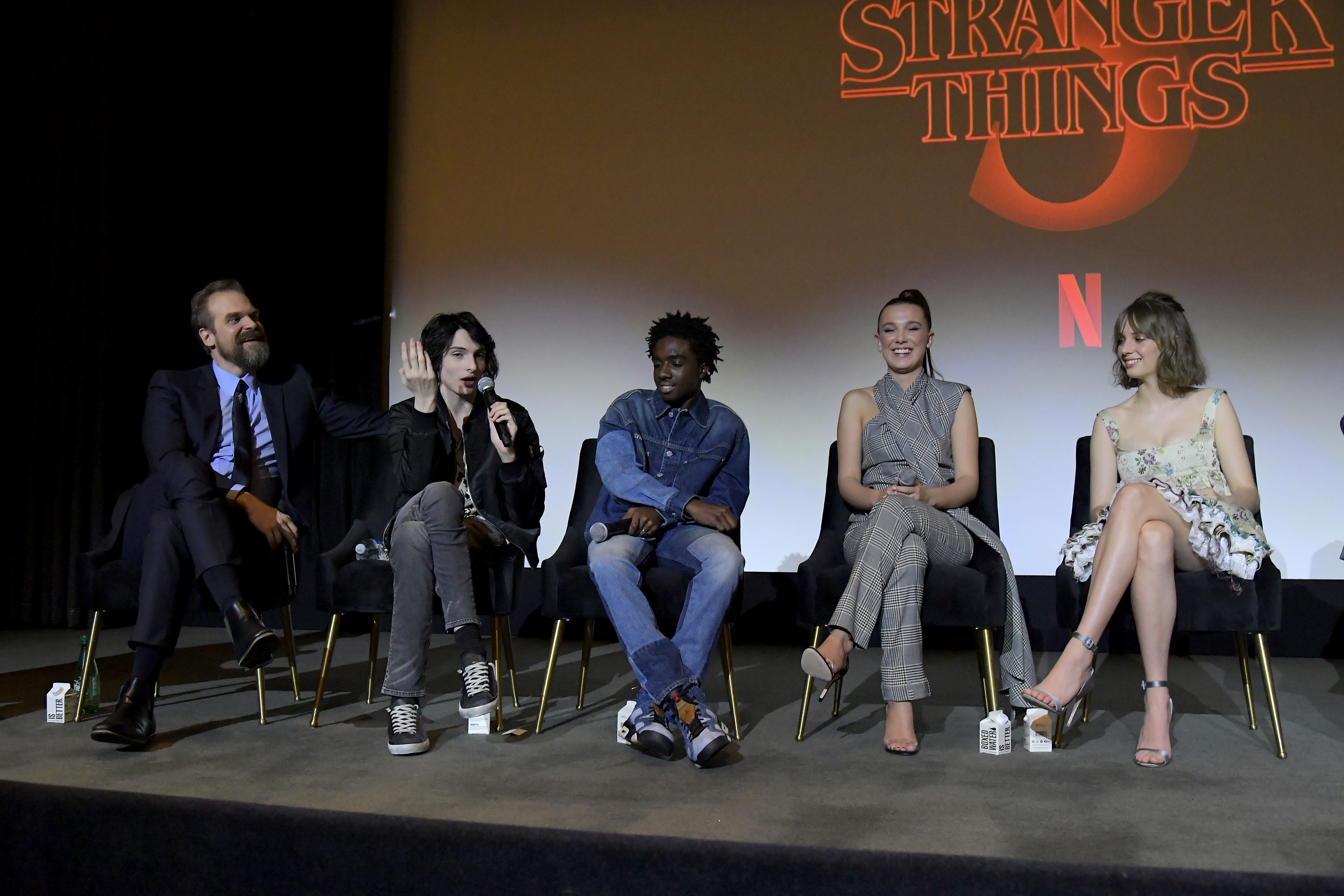 David Harbour, Finn Wolfhard, Caleb McLaughlin, Millie Bobby Brown, and Maya Hawke speak on stage during Netflix's 'Stranger Things' Q&A