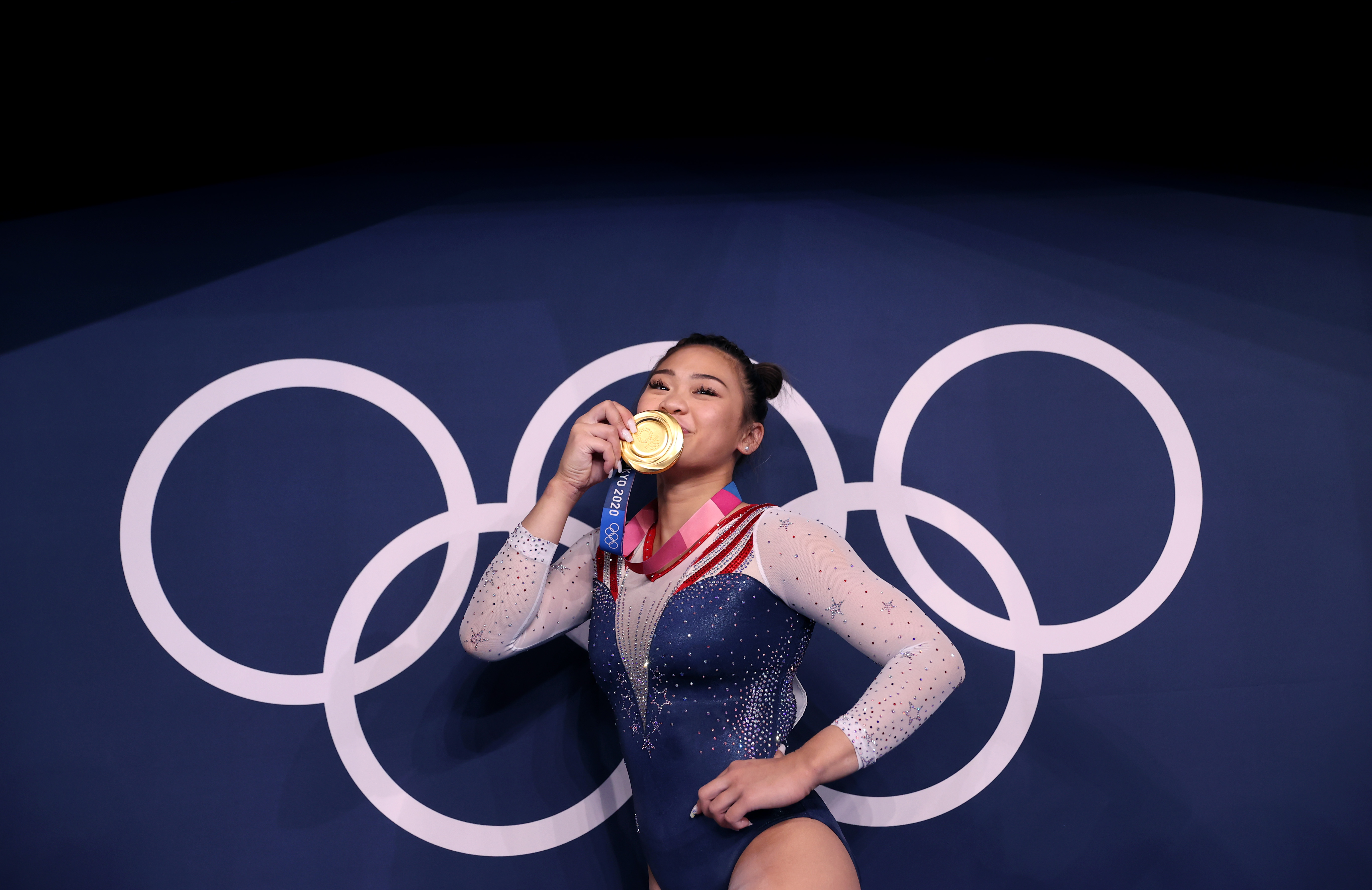 Sunisa Lee of poses with her gold medal after winning the Women's All-Around Final