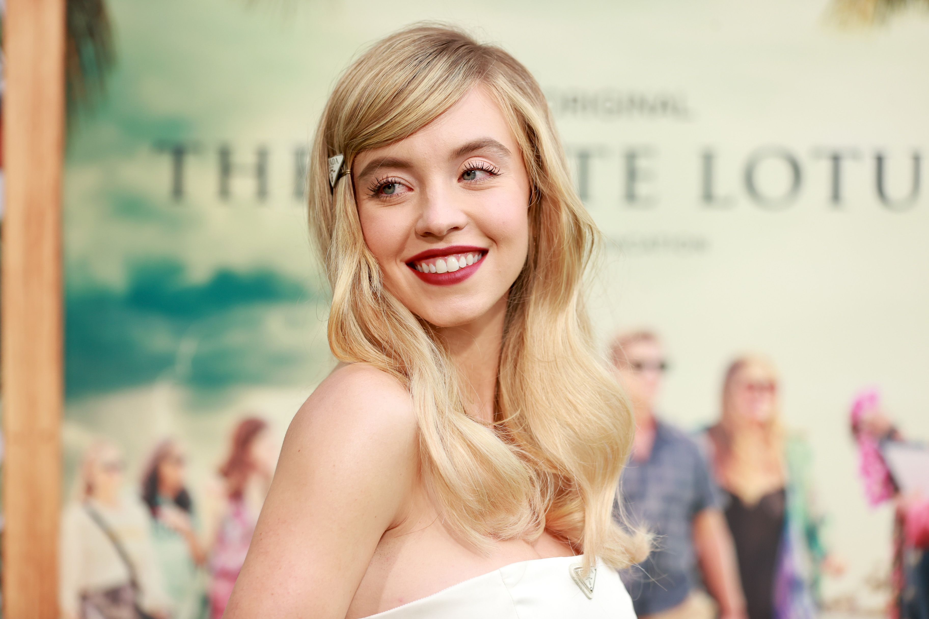Sydney Sweeney age 23 arrives to 'The White Lotus' premiere in Los Angeles in a white dress