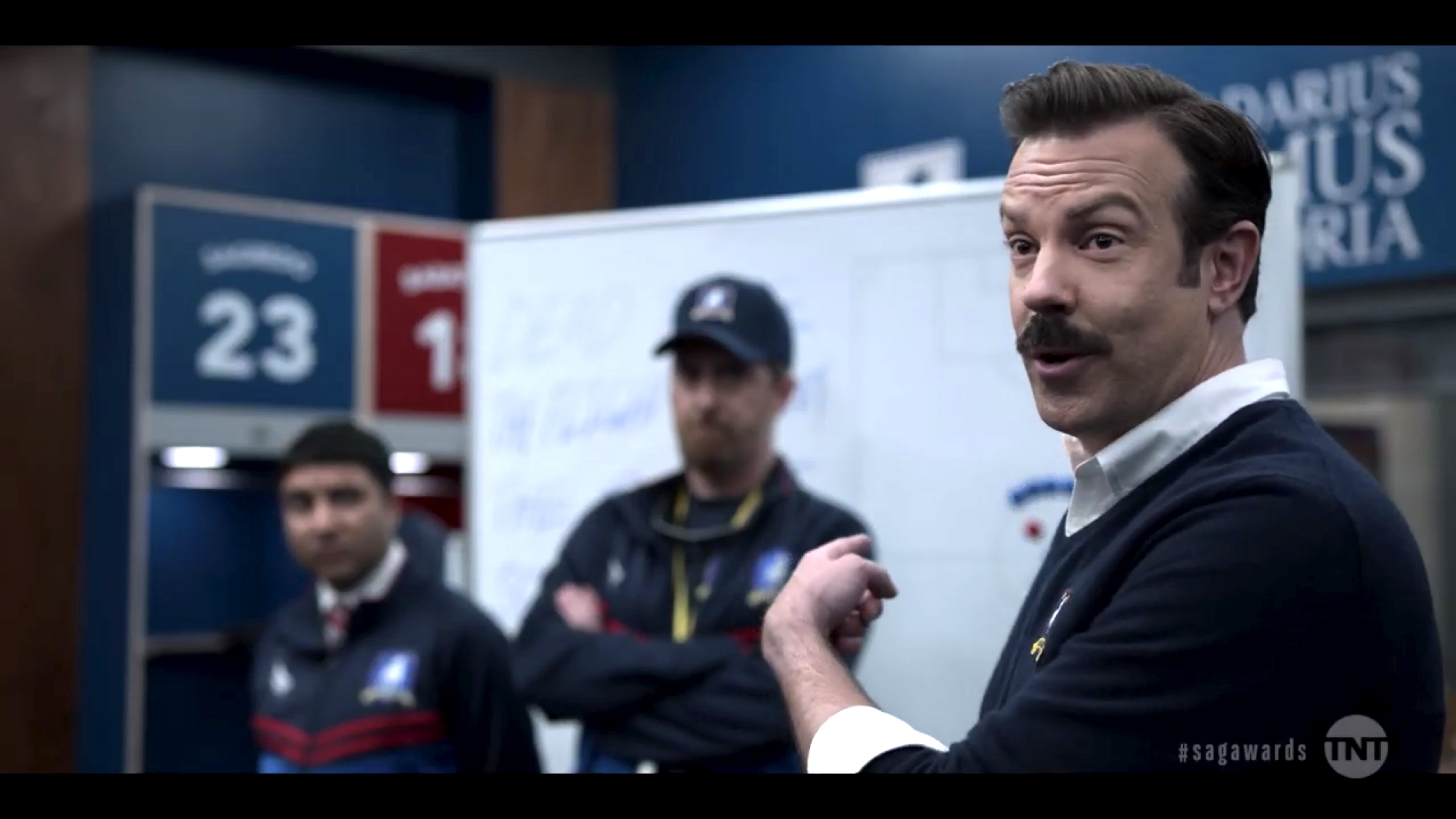 Jason Sudeikis as Ted Lasso character, Brendan Hunt as Coach Beard, and Nick Mohammed as Nathan Shelley