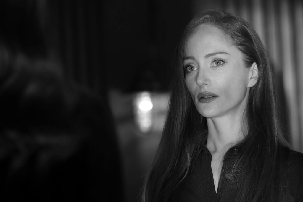 Lotte Verbeek as Katarina Rostova looks on in a black and white frame from the series.