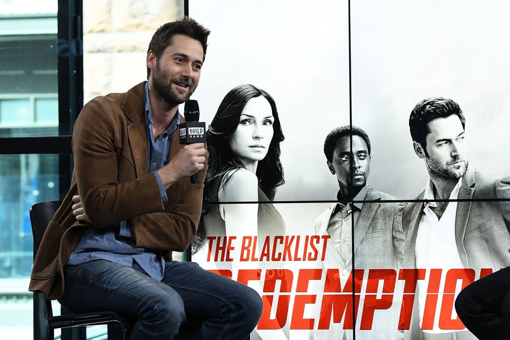 Ryan Eggold sits in a chair to discuss 'The Blacklist: Redemption'.