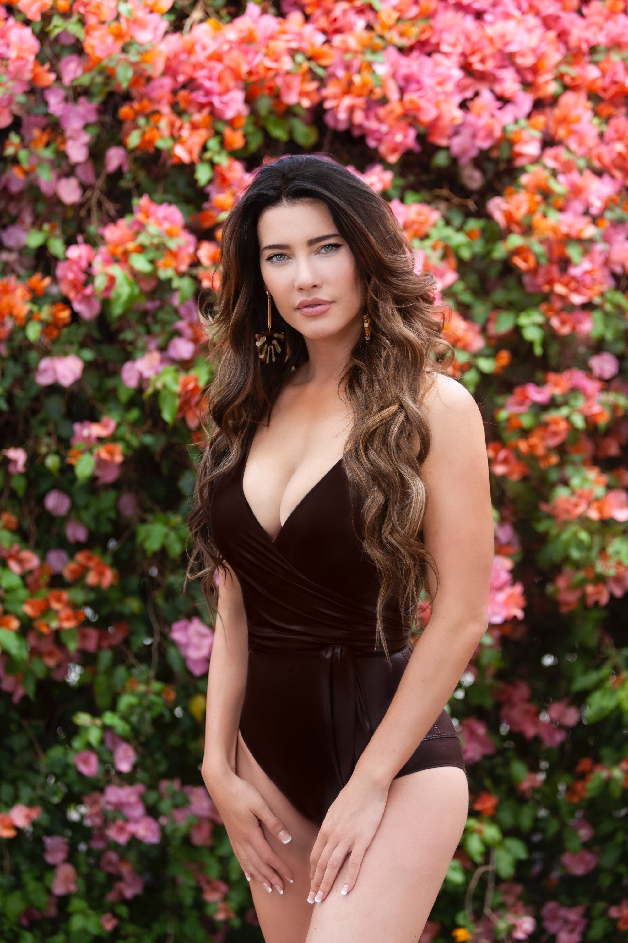 'The Bold and the Beautiful' star Jacqueline MacInnes Wood posing for a photo in a black swimsuit