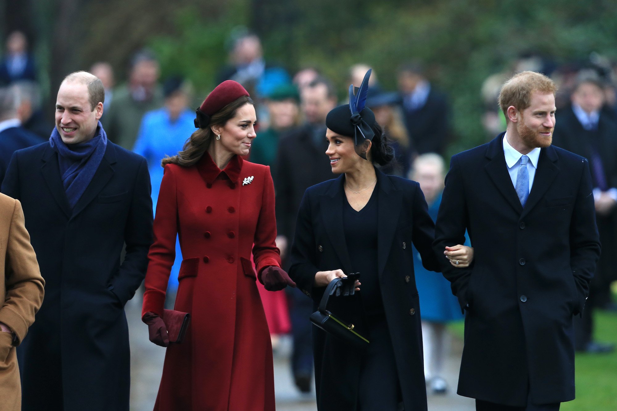 The Royal Family members (L-R) Prince William, Kate Middleton, Meghan Markle, and Prince Harry walking